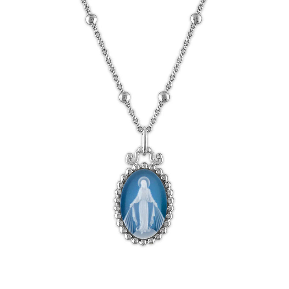 Silver necklace with a blue and white oval Virgin Mary pendant.