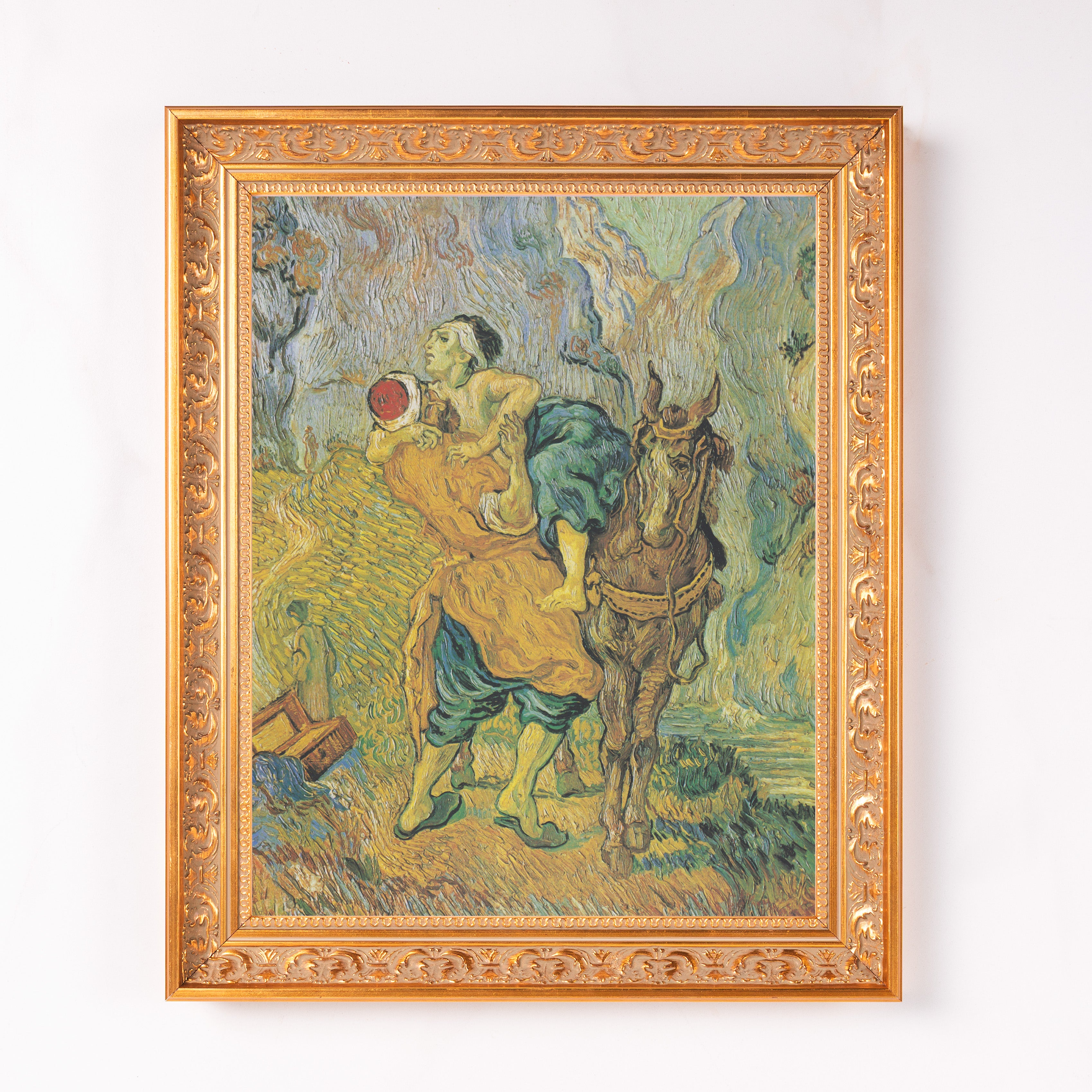 Framed Van Gogh print of a man riding a horse, in gold frame.