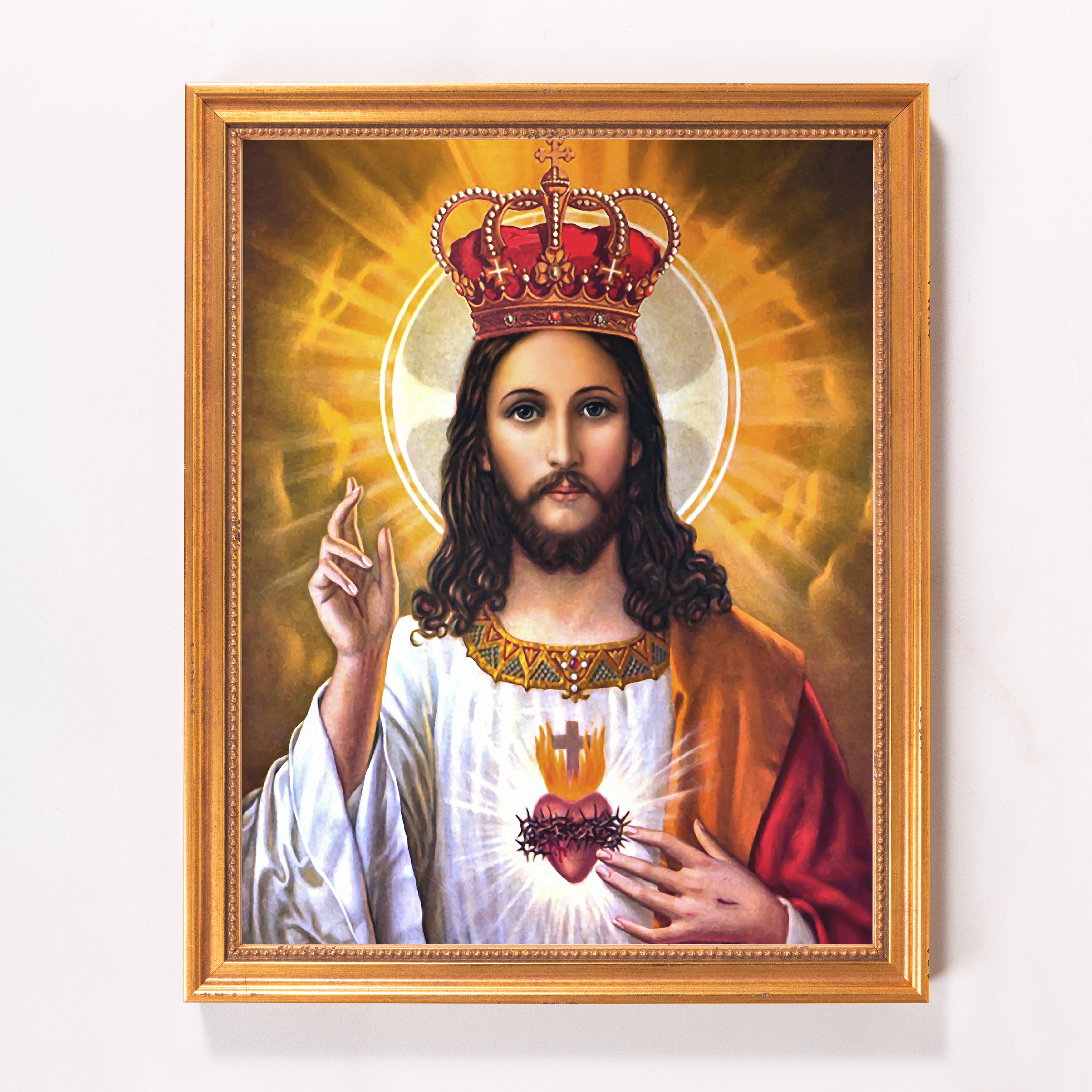 Framed print of Jesus wearing a red crown in a gold frame.