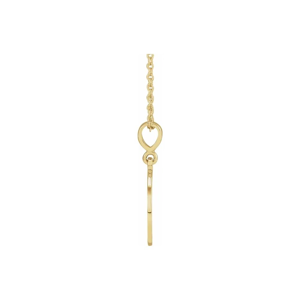 Gold pendant necklace with a thin, simple silhouette charm and delicate chain.
