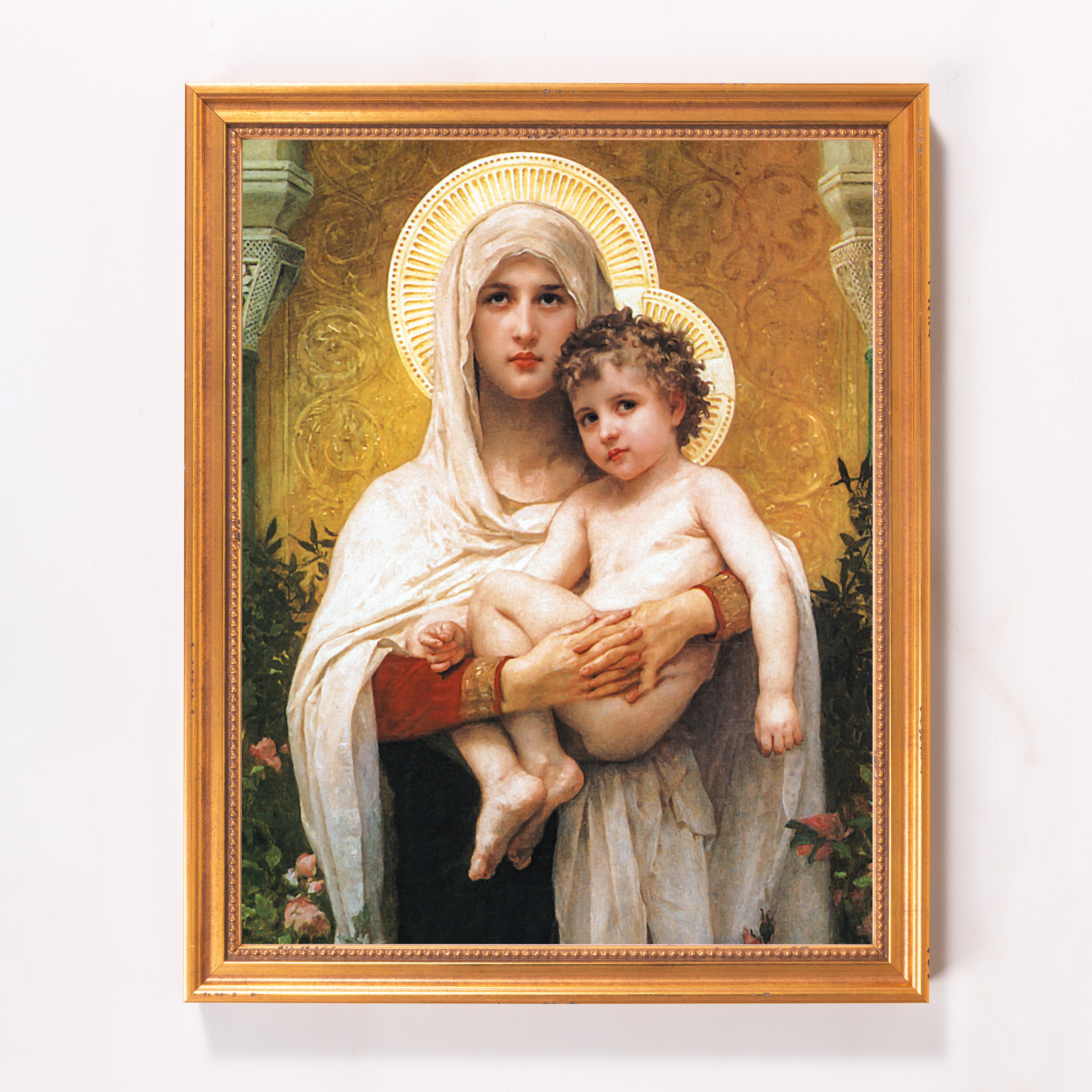 Framed oil painting of Madonna and Child with golden halo, ornate frame.