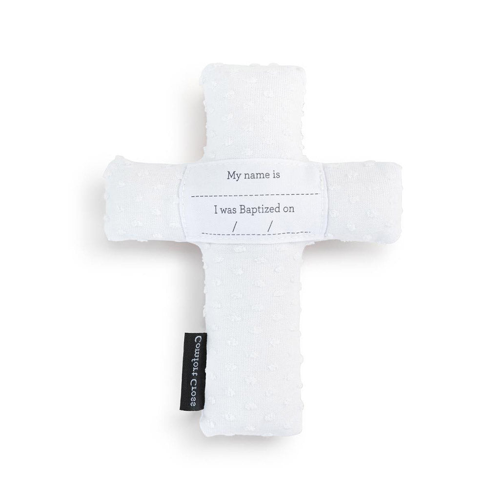 White baptism cross plush toy with name and date fields, textured fabric, modern style.