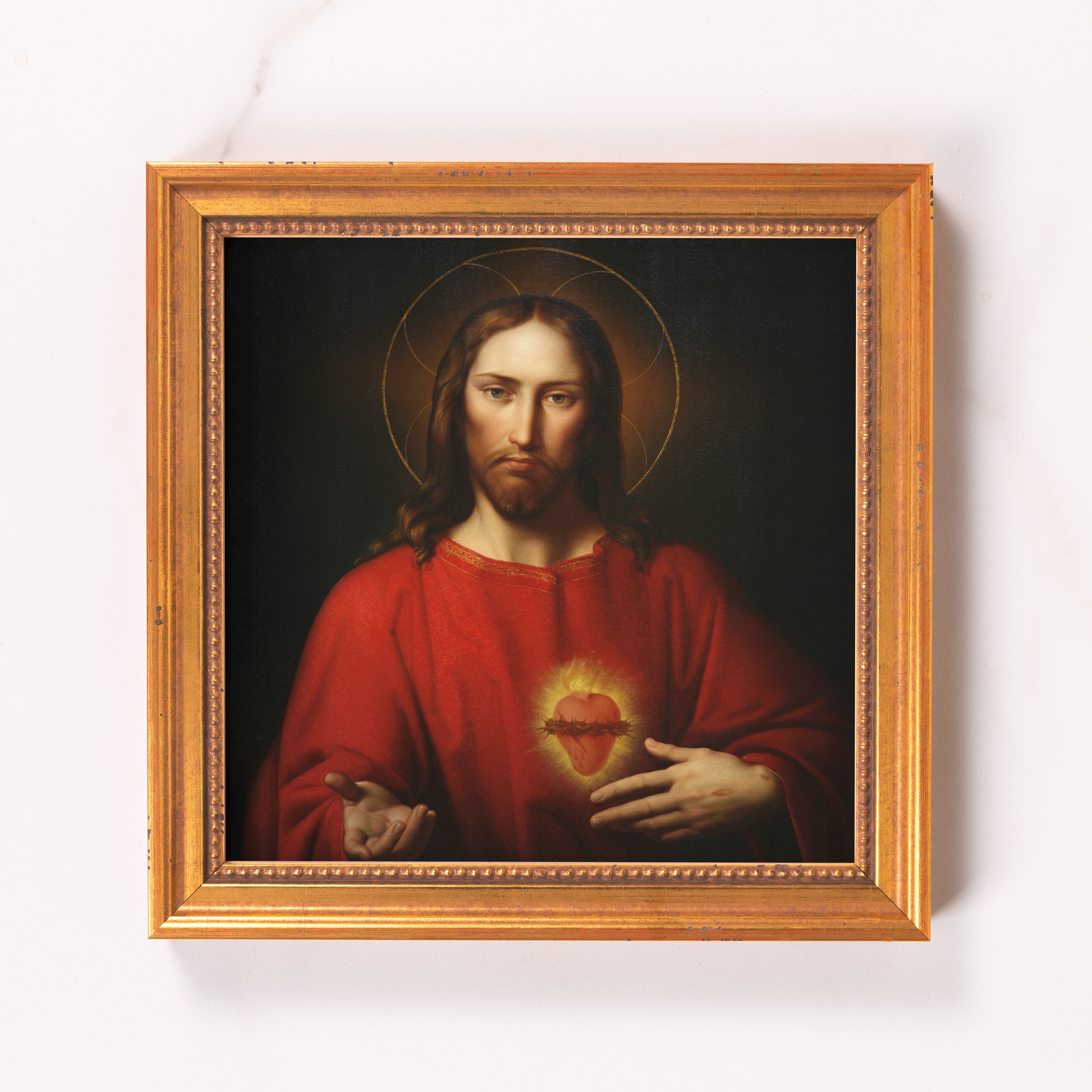 Framed painting depicts Jesus Christ in a red robe with a gold halo.