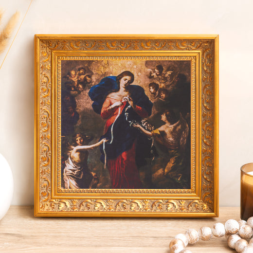 Framed painting of Our Lady Untier of Knots, with a decorative gold frame.