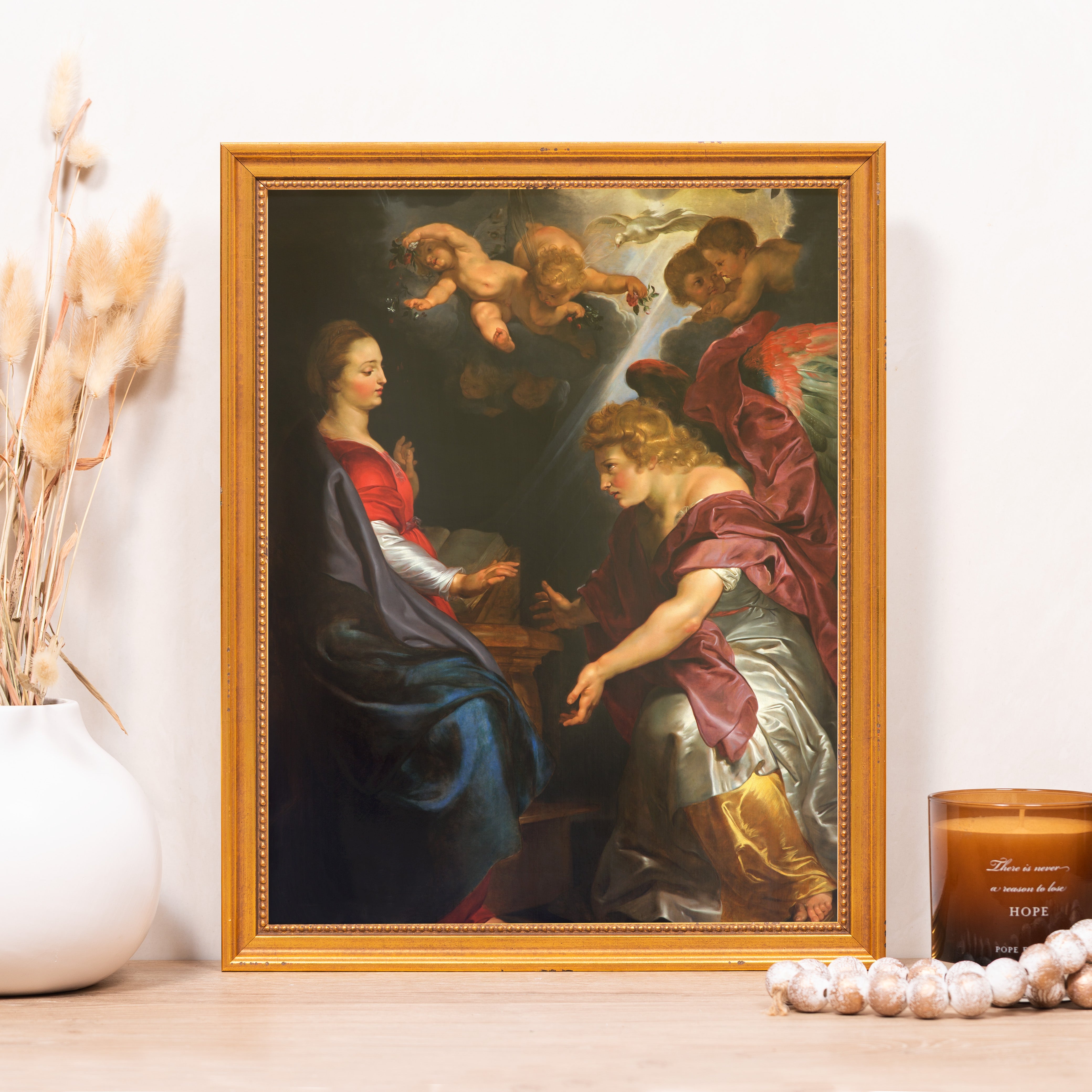 Framed "Annunciation" painting in antique style, with gold frame.