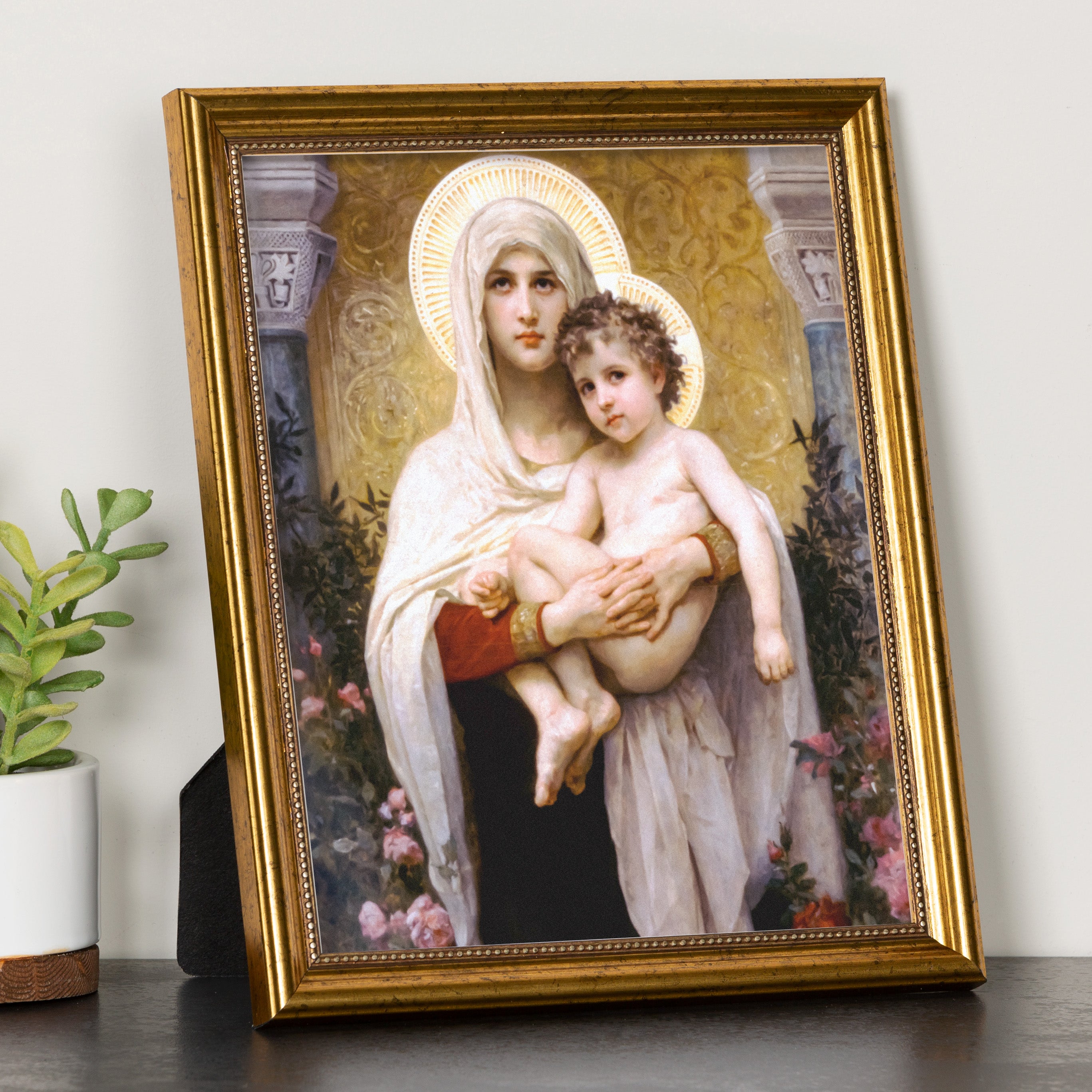 Framed art print of Madonna and Child, gold frame.