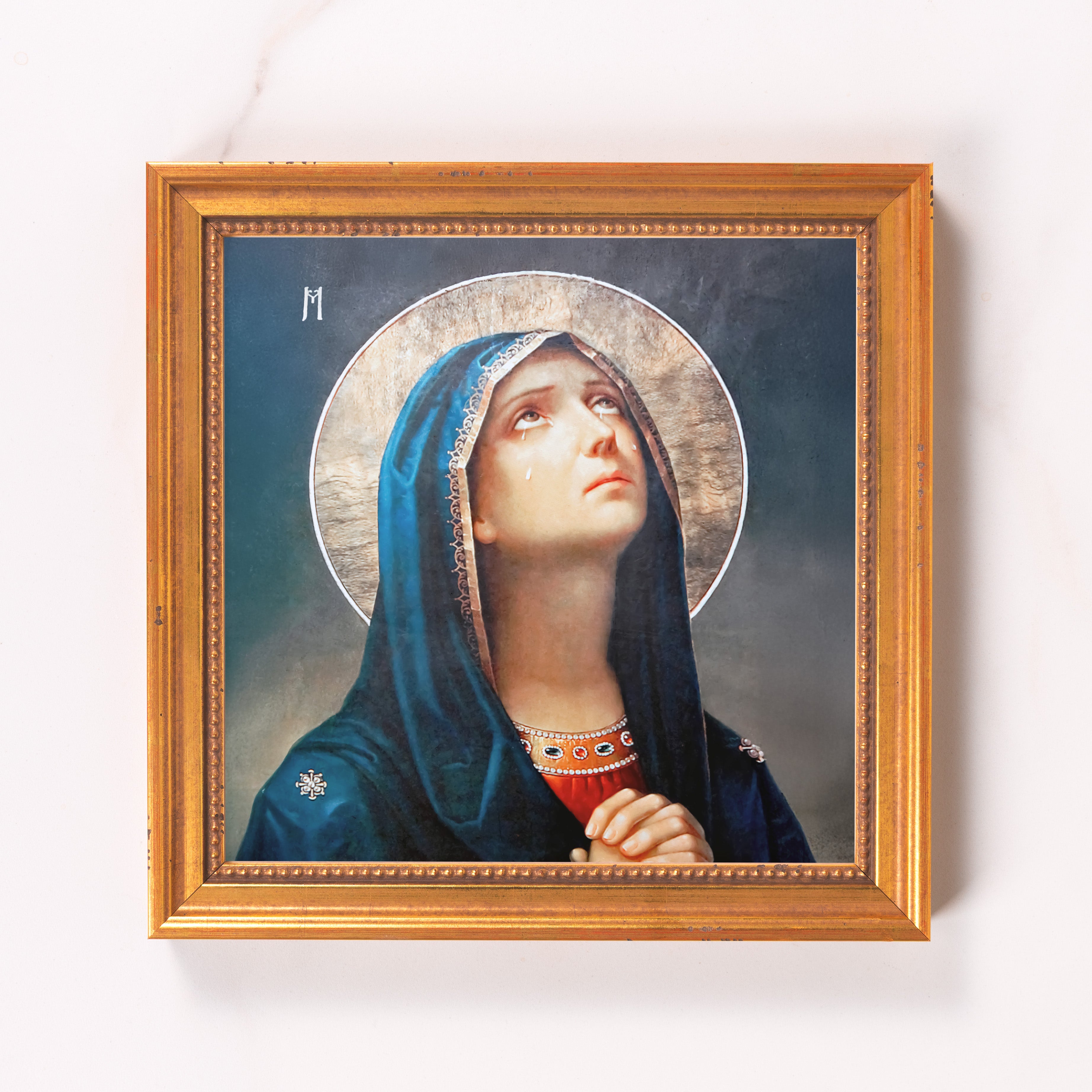 Religious Art: Framed Virgin Mary print; golden halo and tears, gold frame.