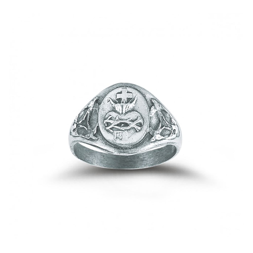 Silver ring has a heart design with a cross on top and leaf details on the sides.