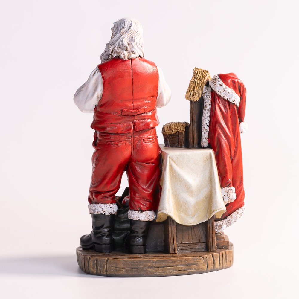 Adoring Santa Figurine