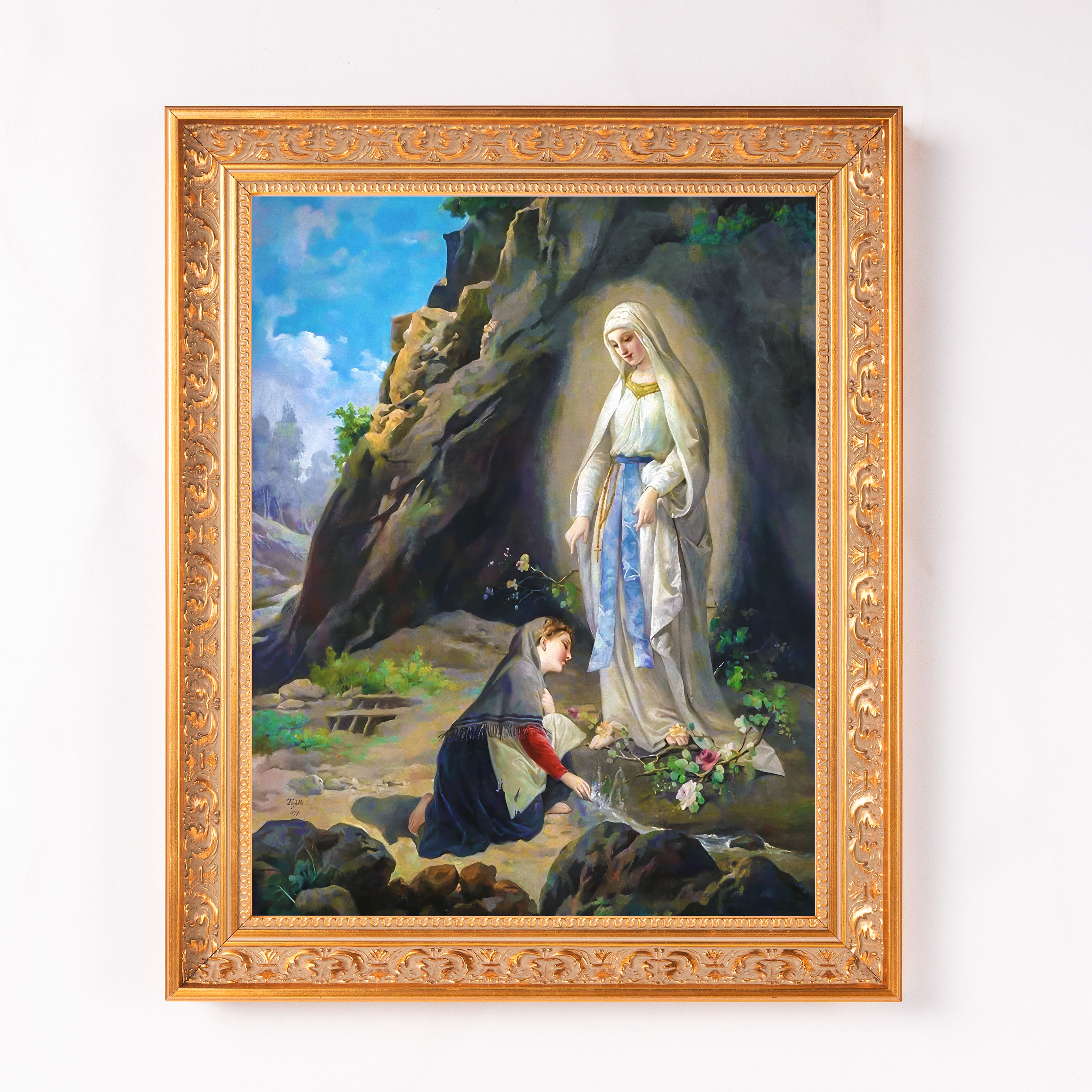 Framed painting of Virgin Mary appearing to kneeling woman; gold ornate frame.