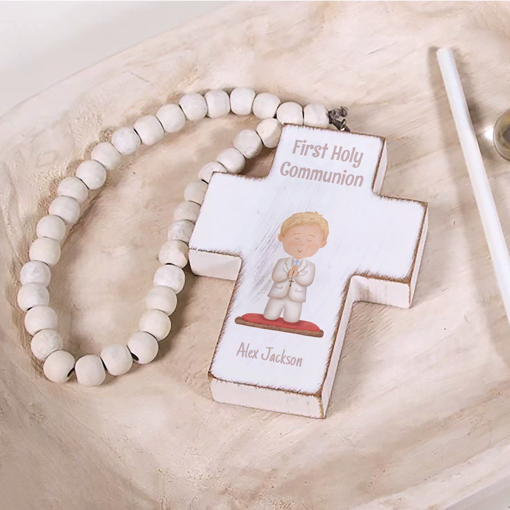 First communion wood cross ornament with white beads and personalized name, "Alex Jackson" on it.