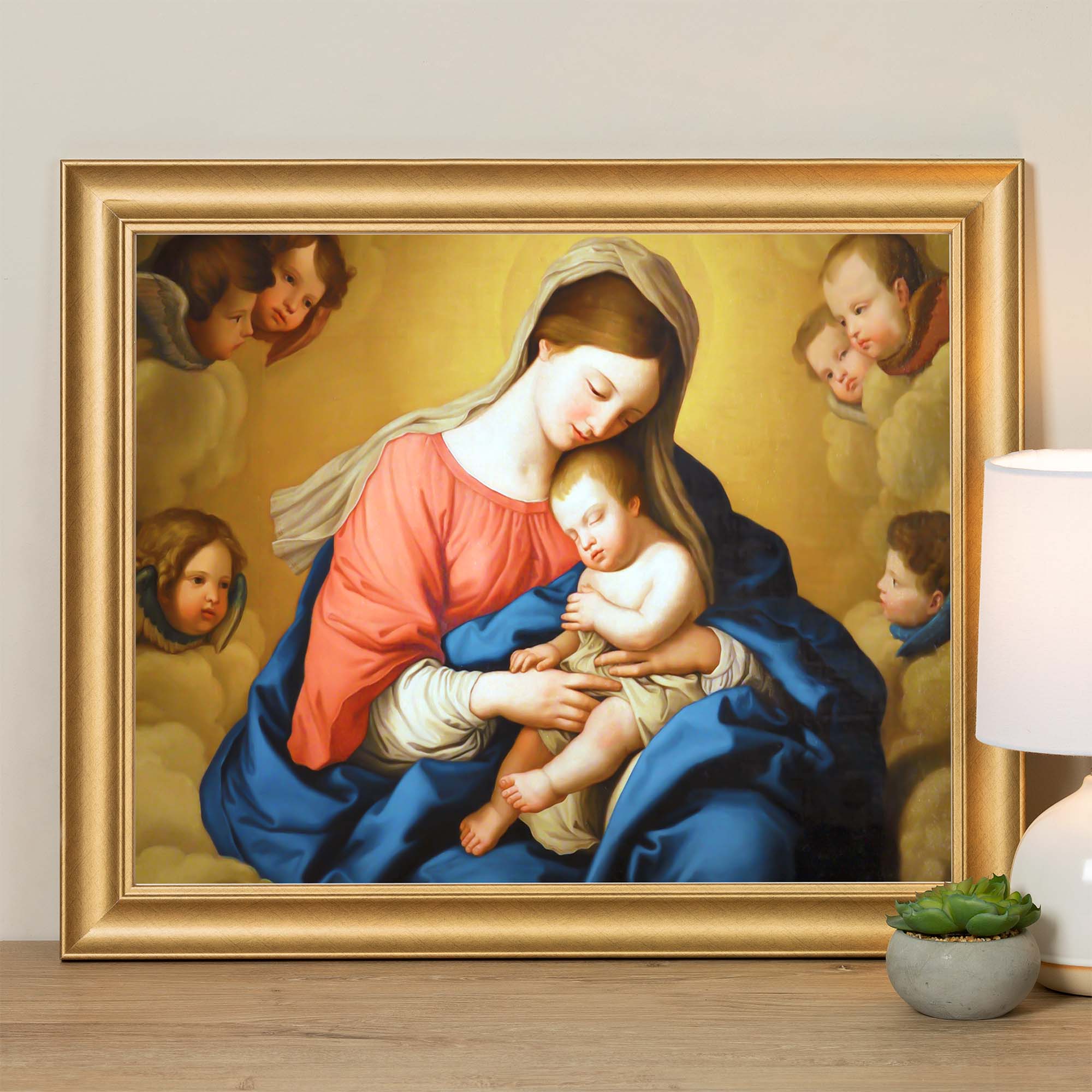 Framed print of Madonna and Child with angels, painted in traditional style with a gold frame.