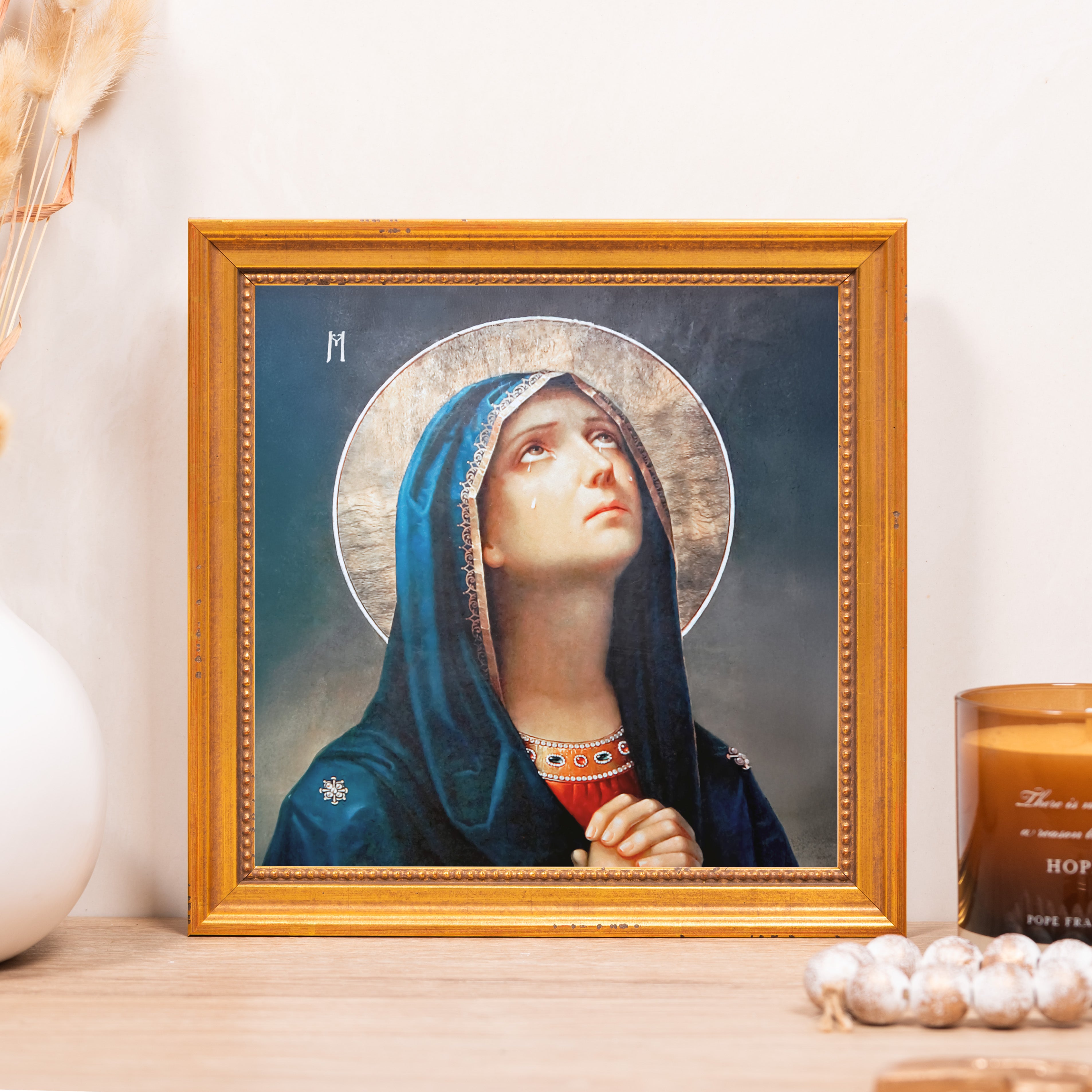Framed painting of Virgin Mary, gold frame, religious art.