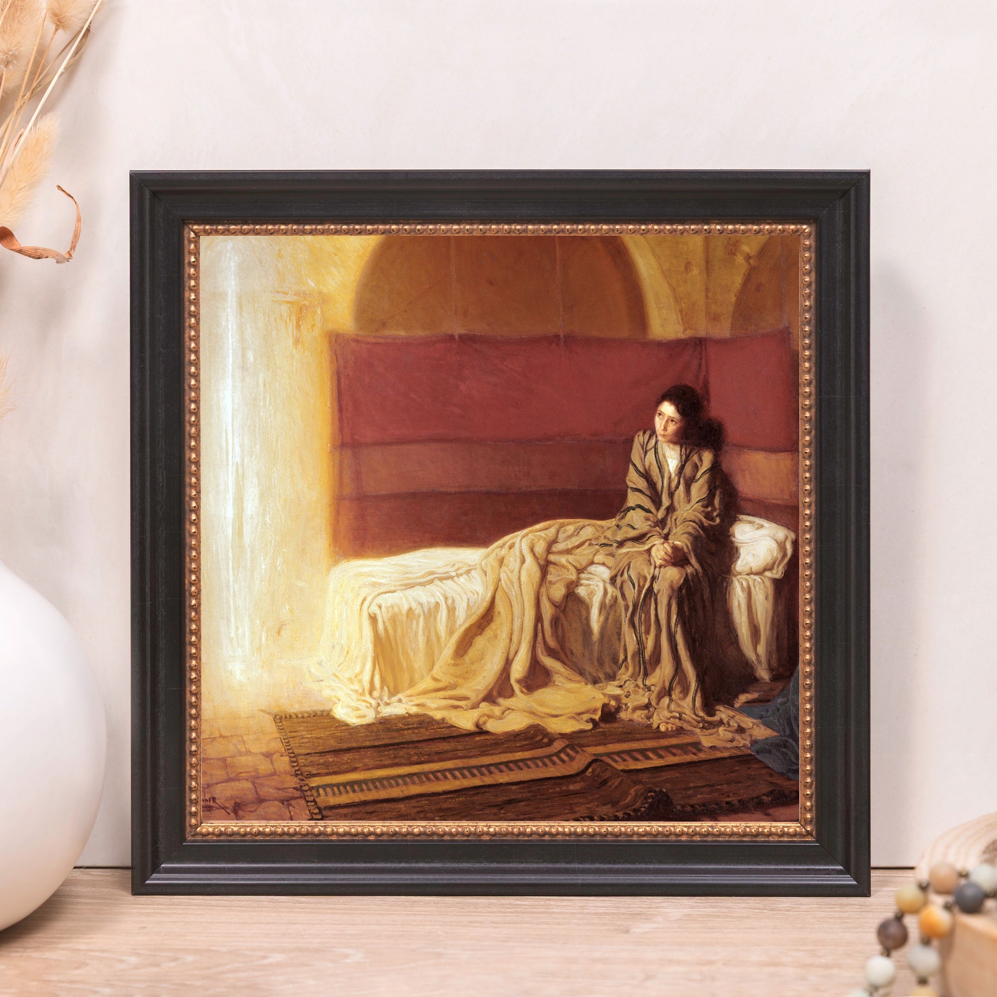 Framed, Oil painting of seated woman in a room in dark wood frame with gold trim.