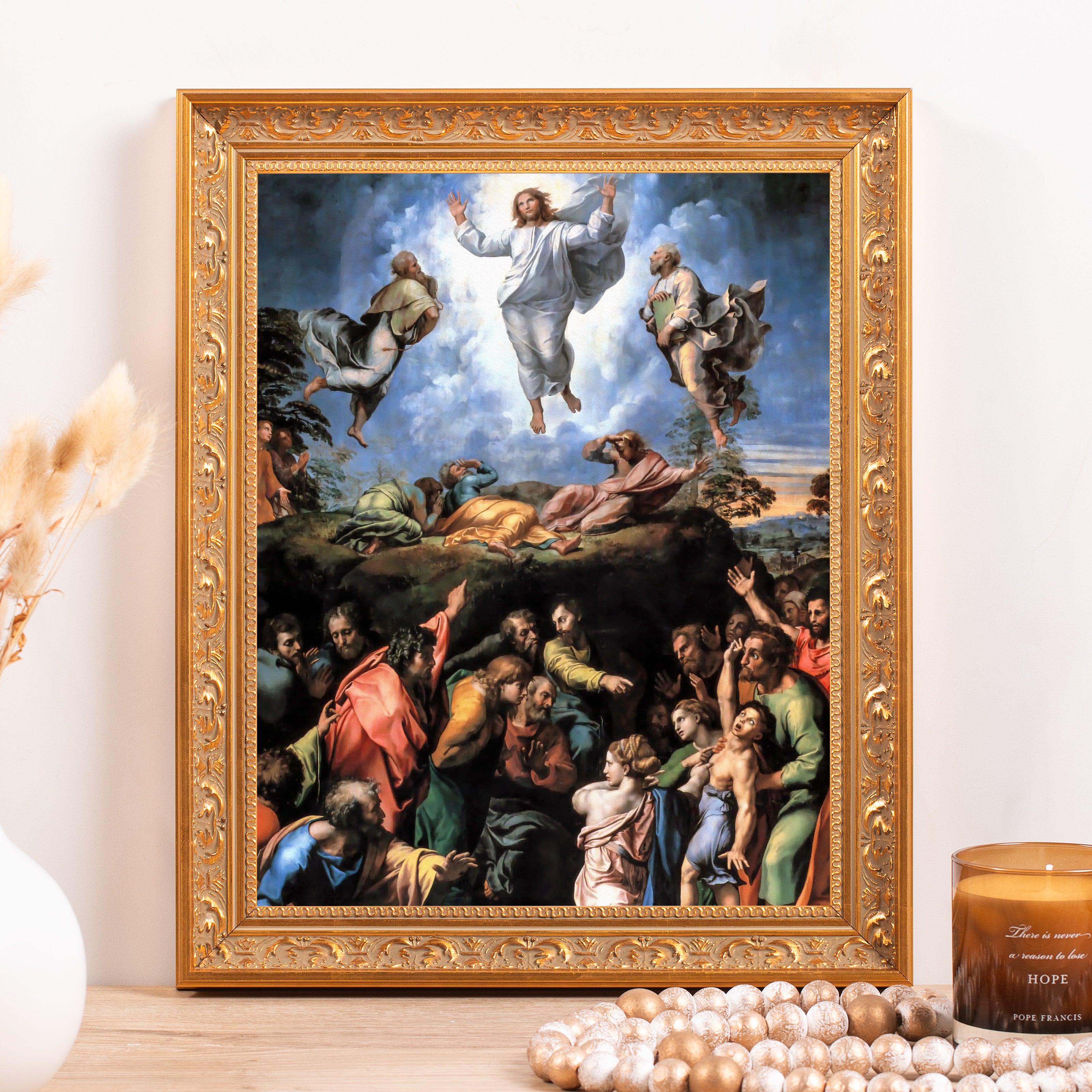 Framed print of Jesus' Transfiguration, painted in a classical style with a golden frame.