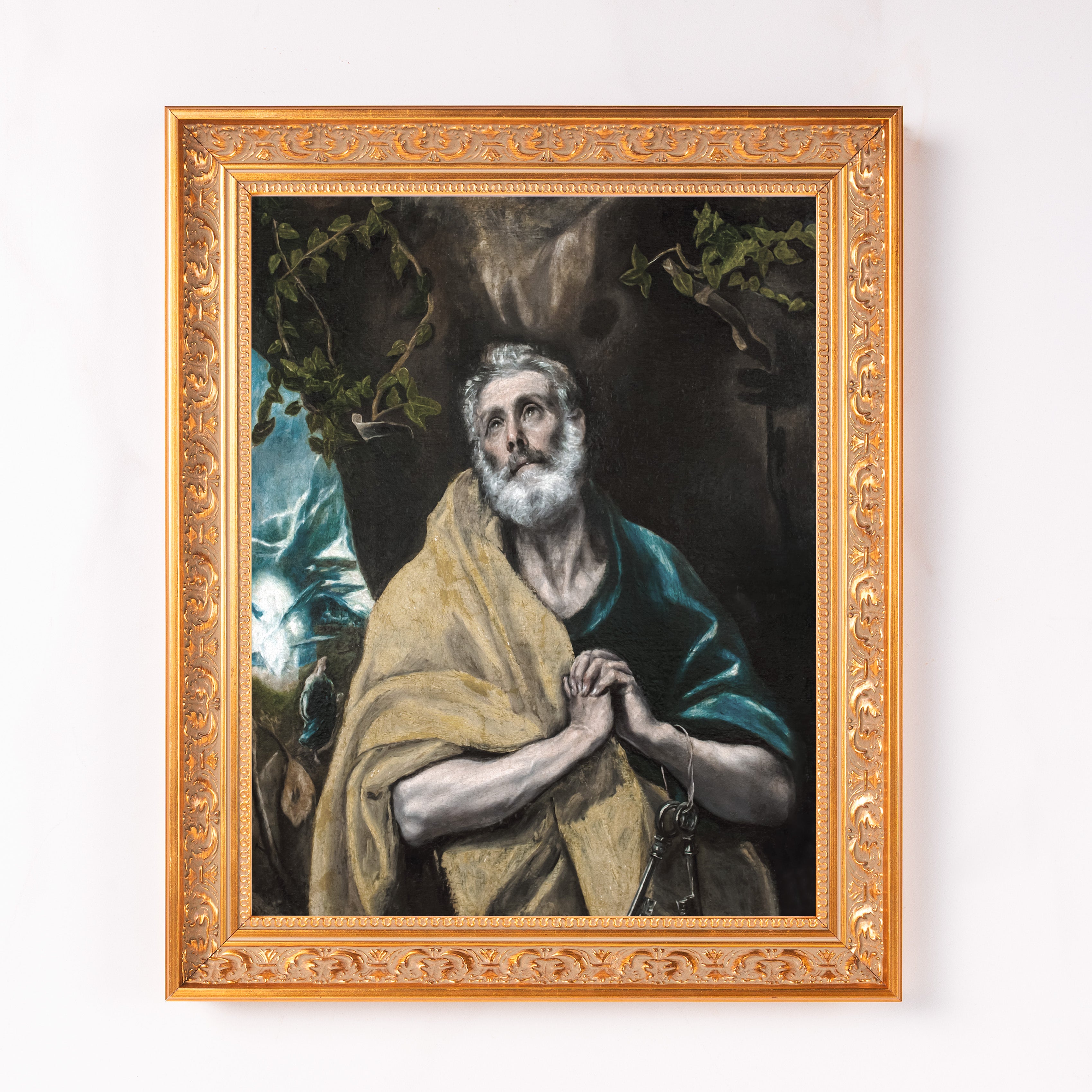 Framed portrait of St. Peter with white beard and gold keys, in ornate gold frame.