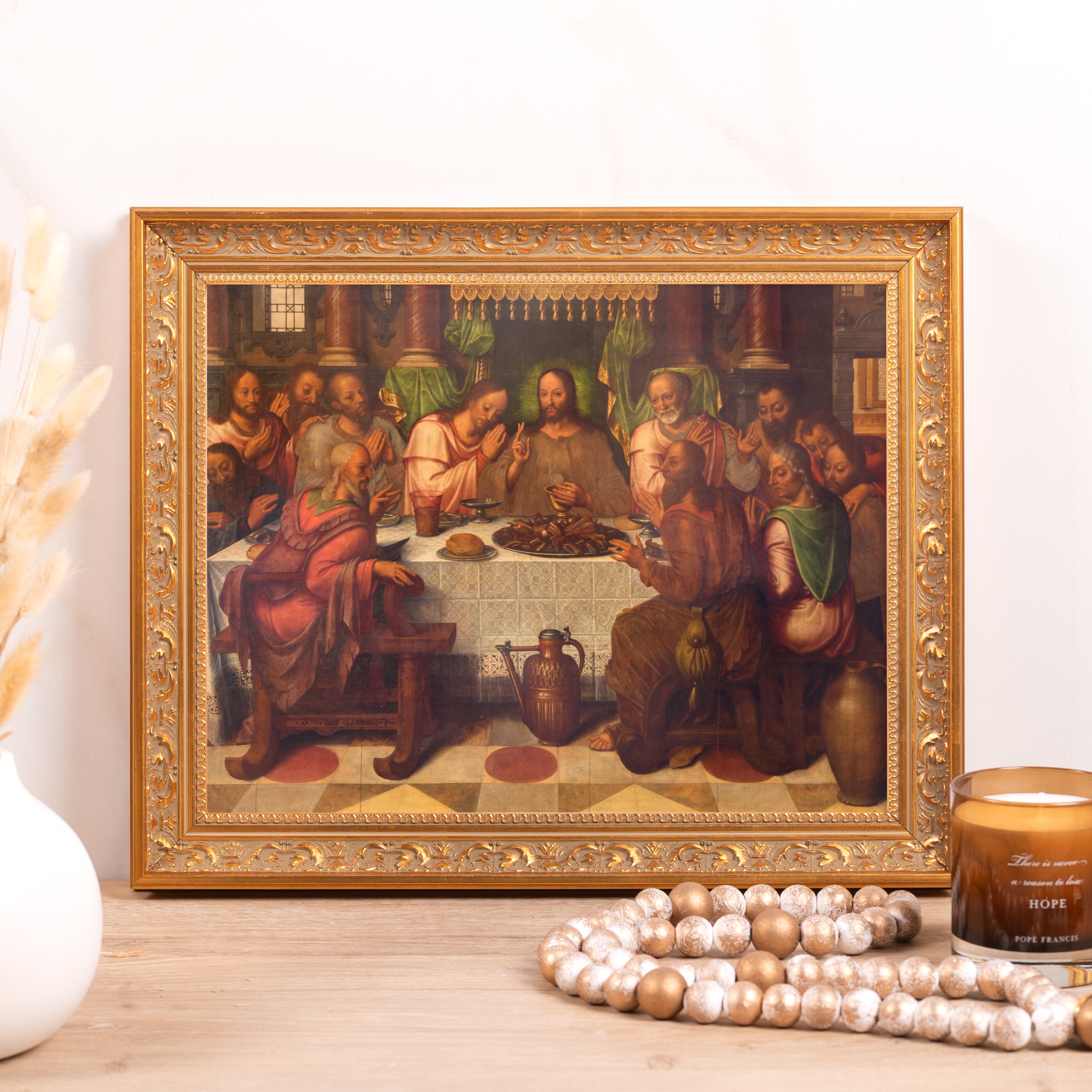 Framed "Last Supper" print with a decorative gold-toned frame for religious home decor.