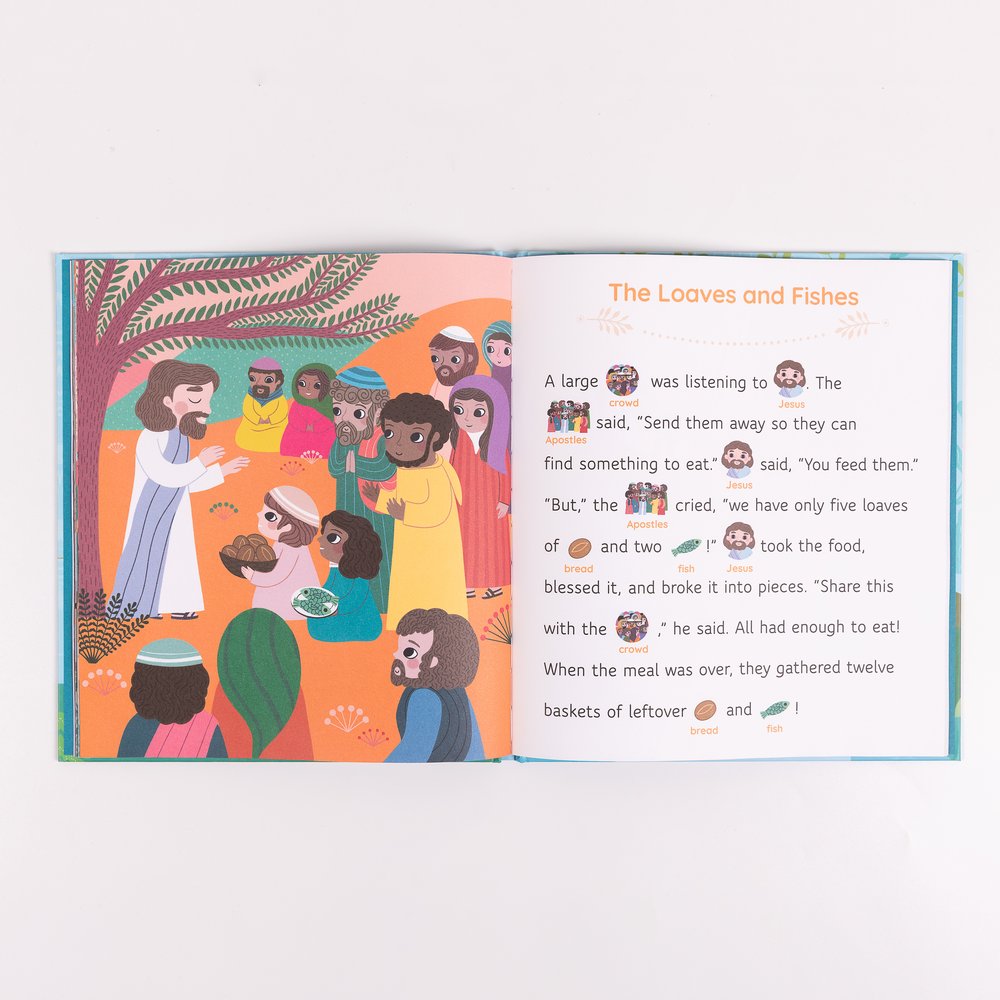 Opened Children's Book: Features an illustration of Jesus sharing bread and fish with a crowd, alongside the story's text.
