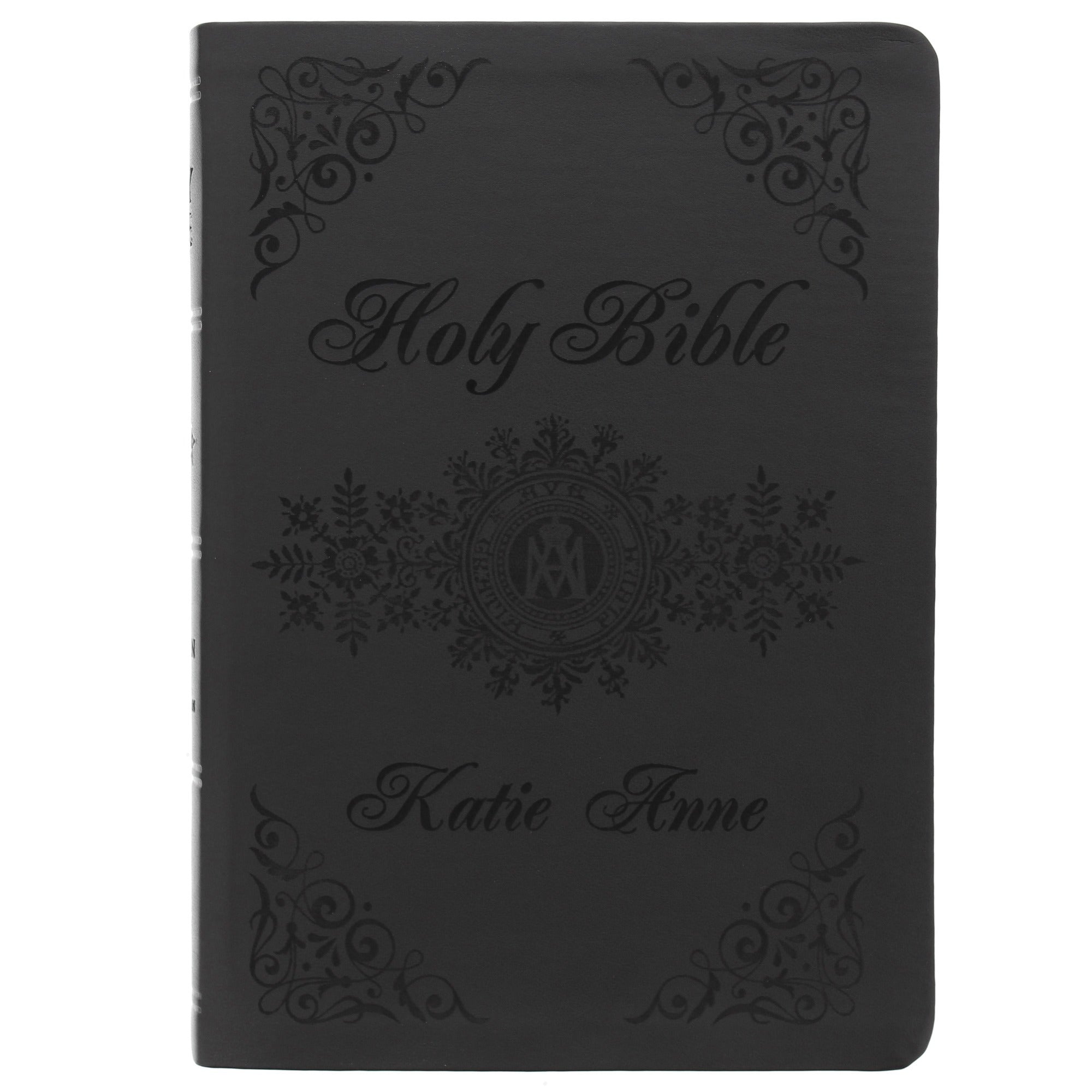 Black, Hardbound Holy Bible with custom name, embossed floral design.