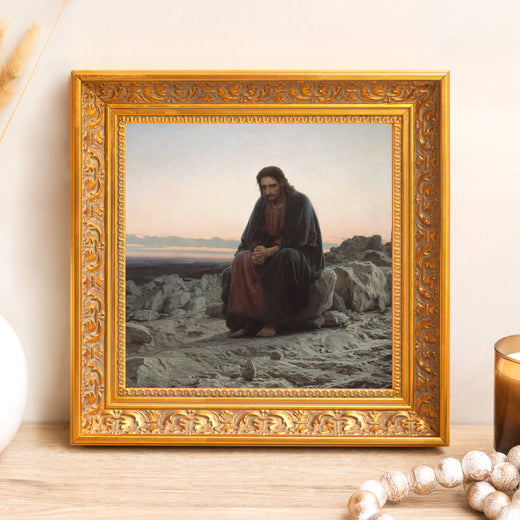 Framed painting depicting Jesus praying on mountain, warm gold, ornate frame, religious wall decor art print.