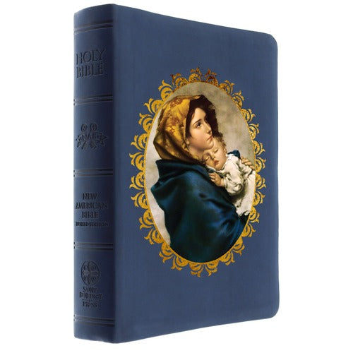 Holy Bible with blue cover and image of Mary holding baby Jesus in a gold decorative oval frame.