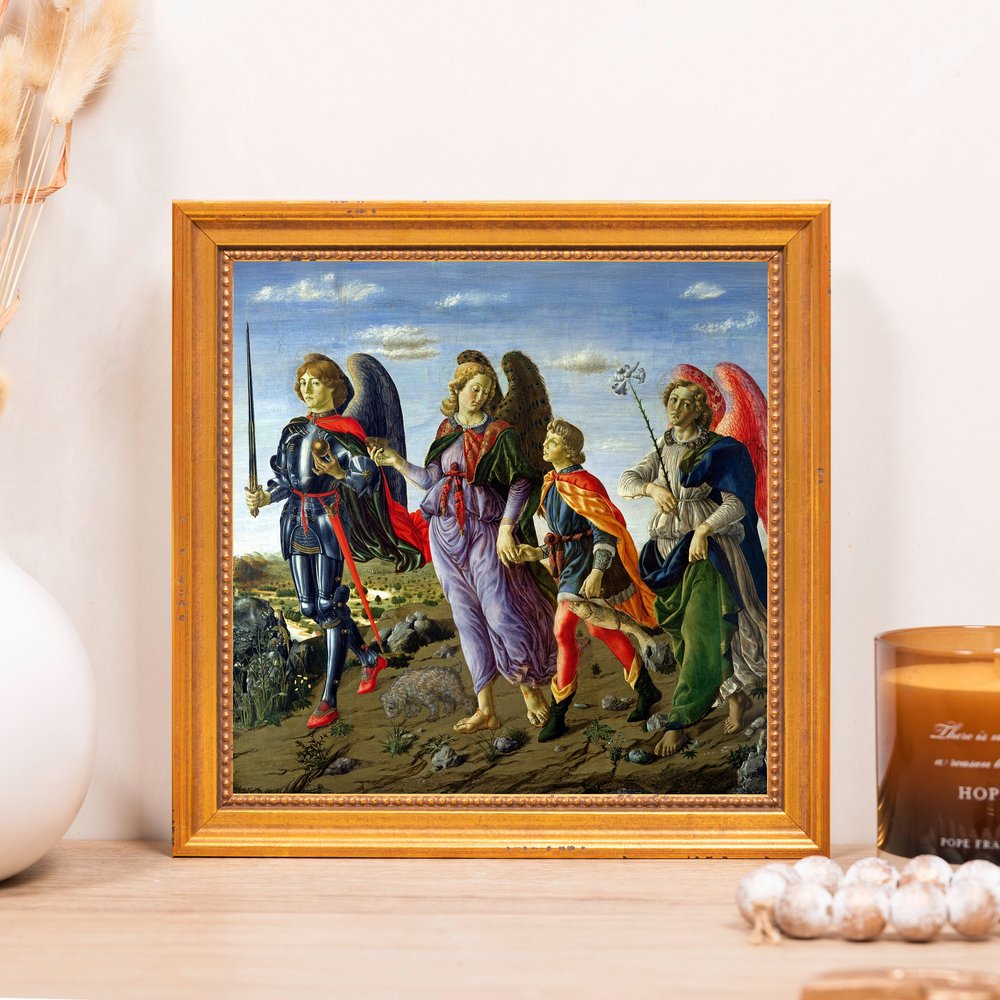 Framed print of Tobias and the Angel painting, depicting four figures with wings in detailed renaissance style, set in an ornate gold frame.