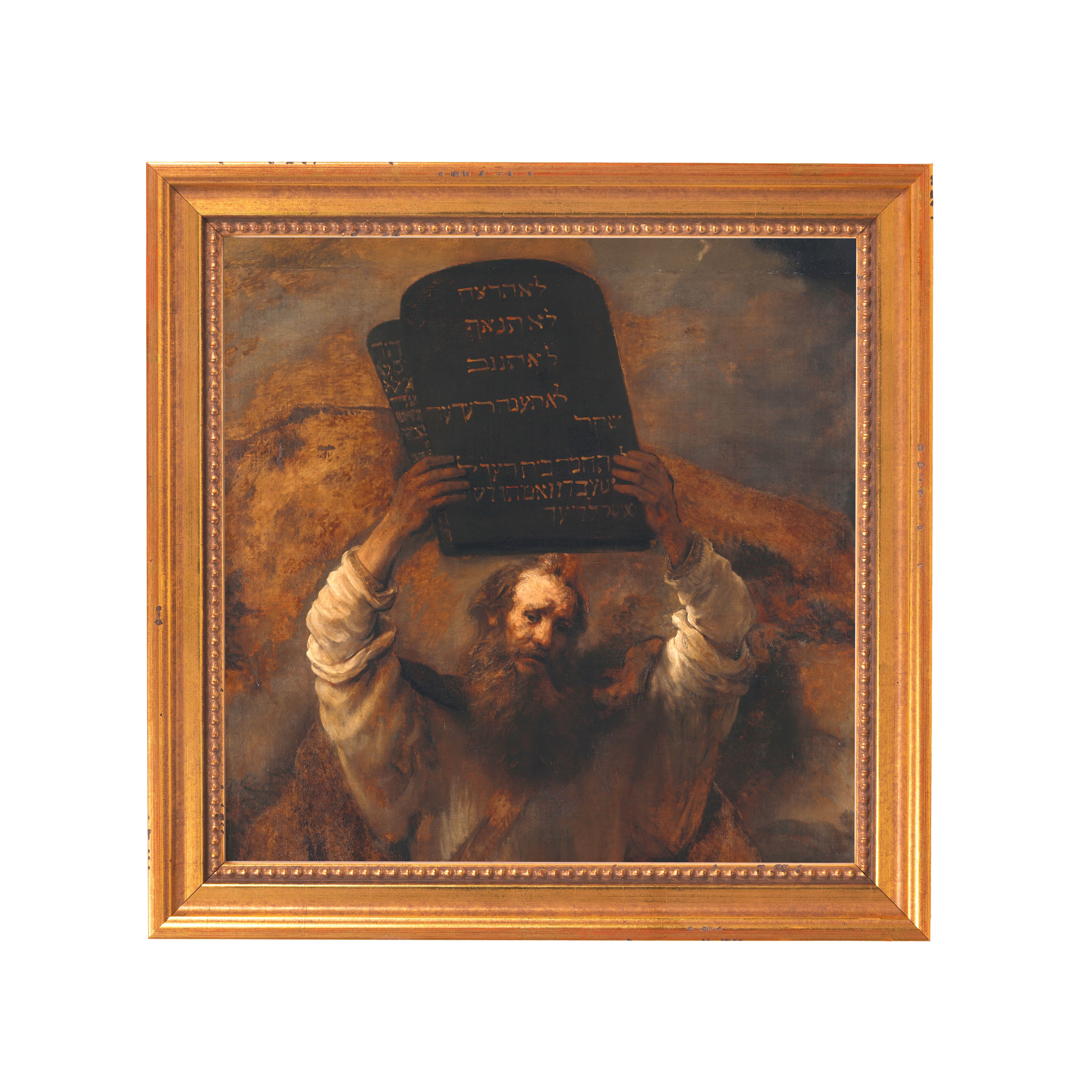 Framed painting shows Moses holding the Ten Commandments; earth-tone art with a gold frame.