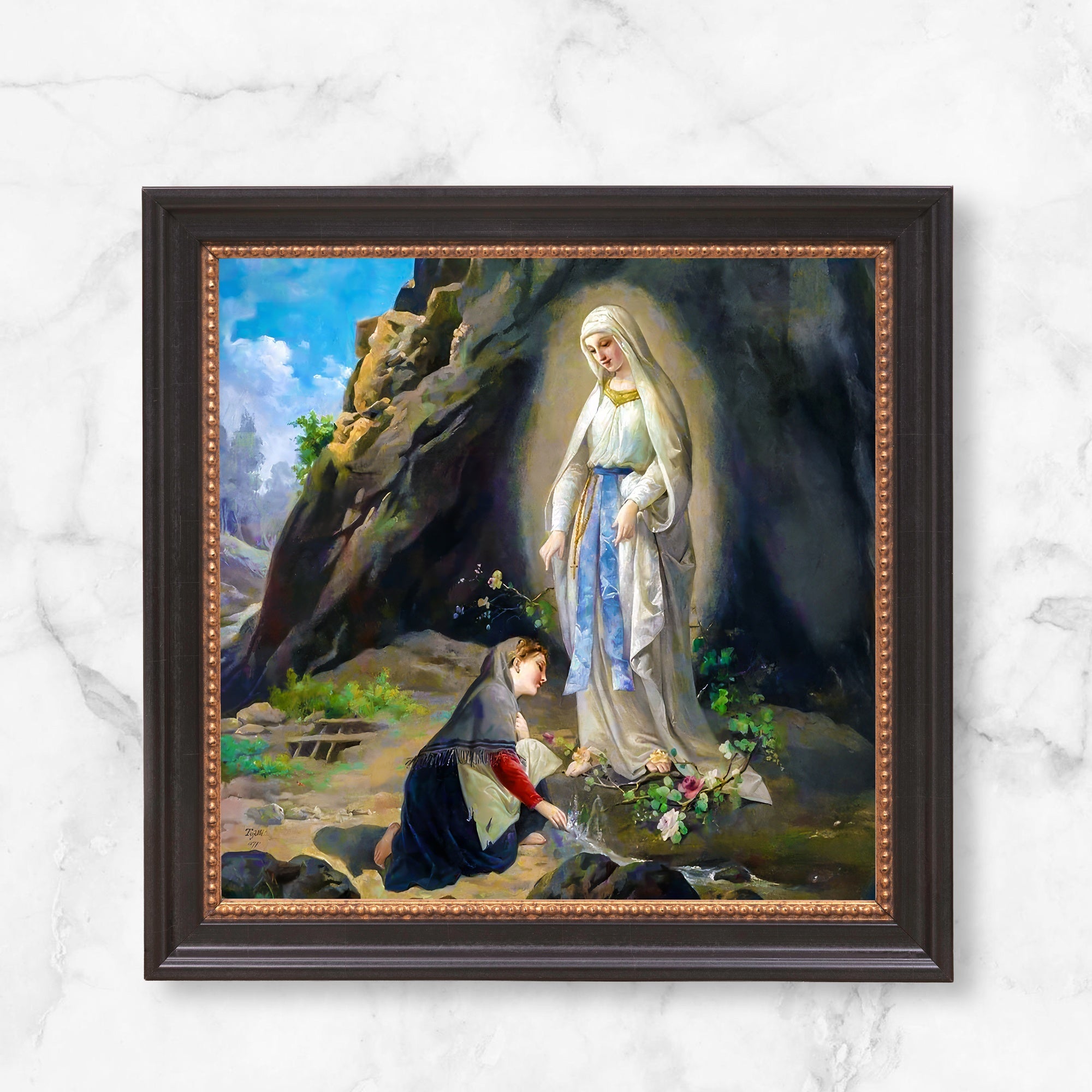 Framed oil painting of the Virgin Mary and Bernadette in a rustic landscape, in dark brown frame.