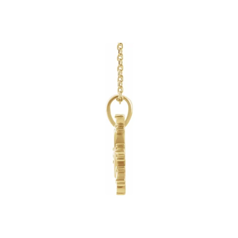 Gold necklace with a snowflake pendant, side view, on a delicate chain.