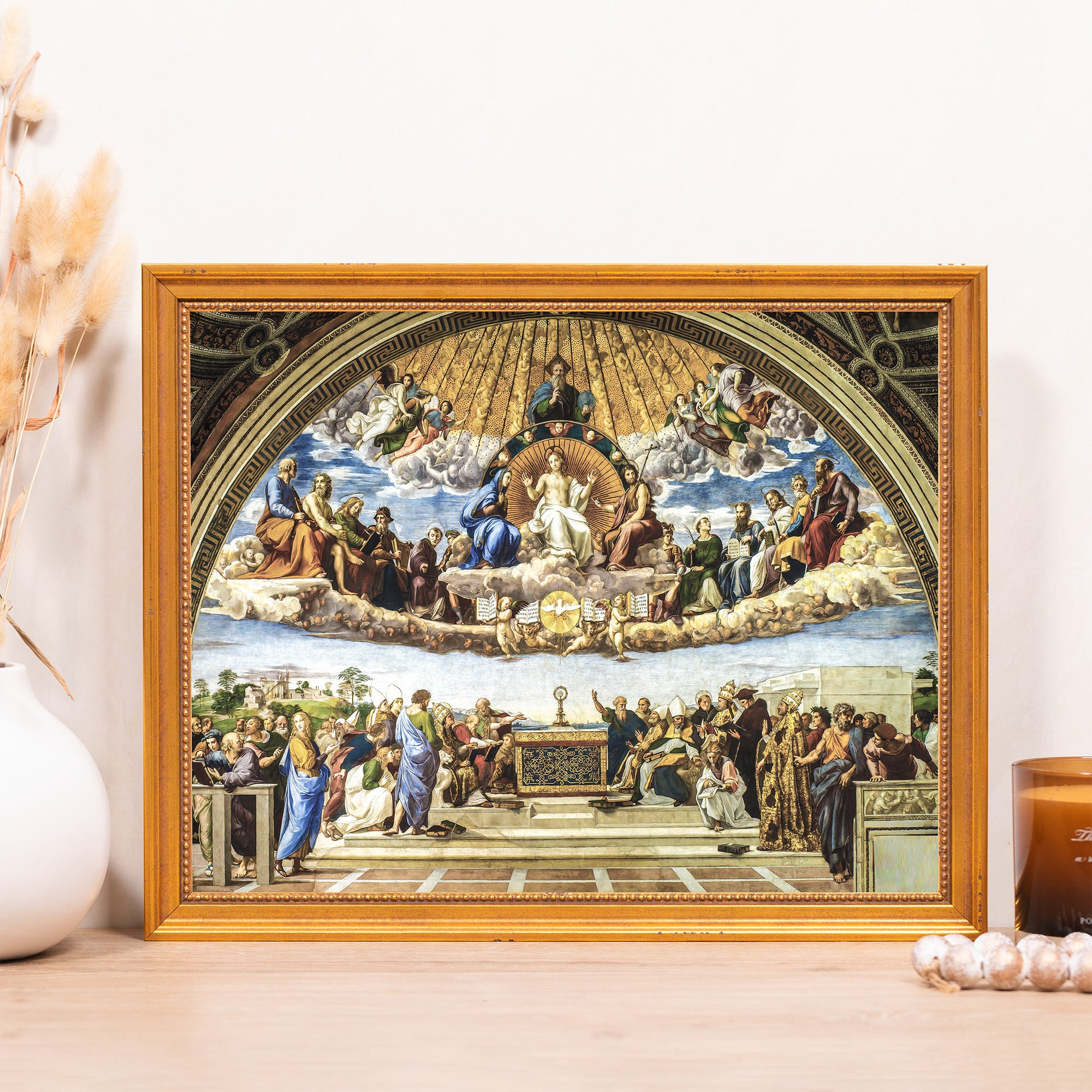 Framed print of Raphael's "Disputation of the Holy Sacrament" painting with a gold-toned frame.