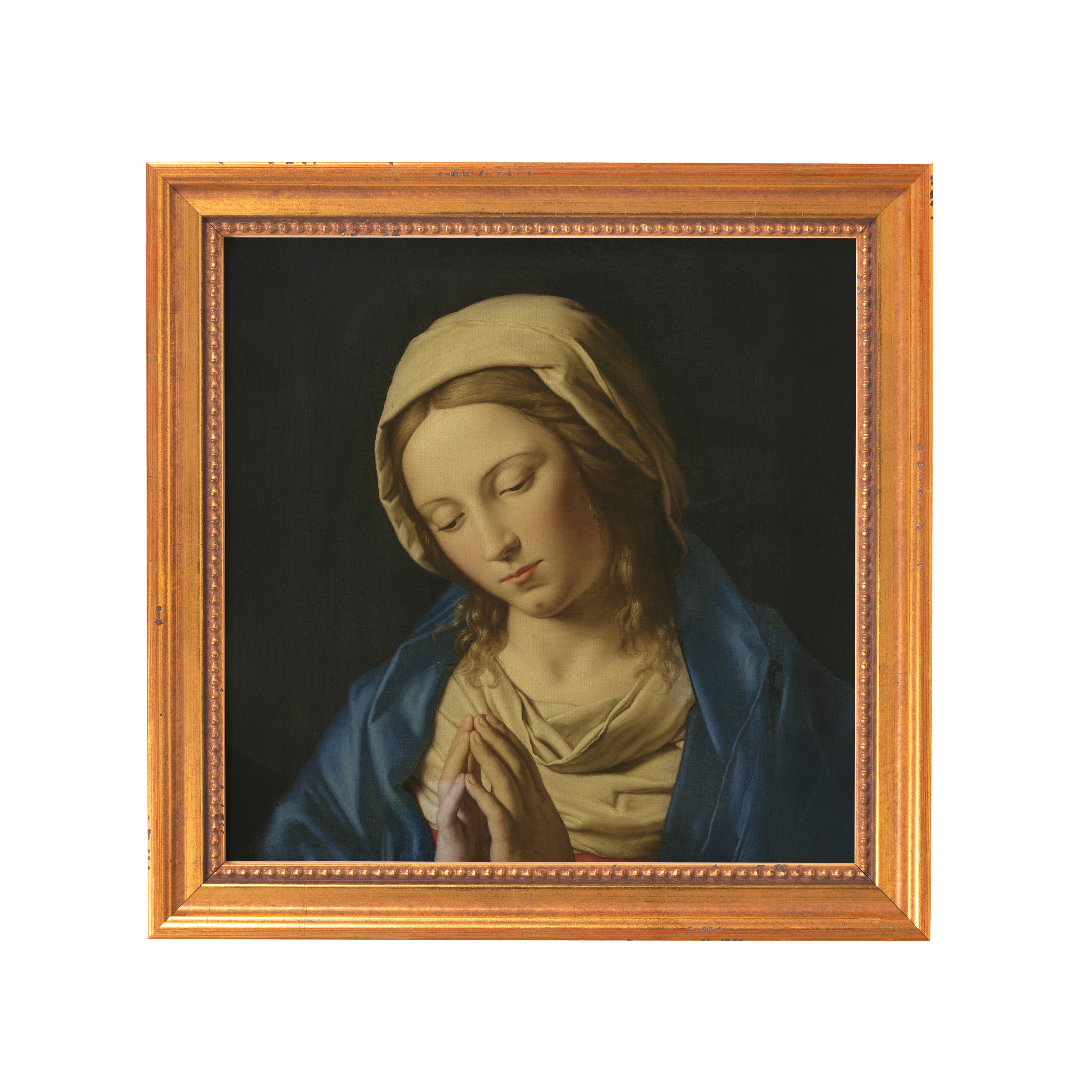 Framed painting of praying Mary in blue robe and cream-colored head covering.