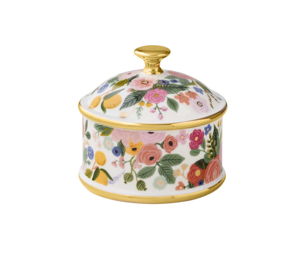 Floral lidded sugar bowl. White ceramic, gold trim and knob, and colorful flower and fruit illustrations all over.
