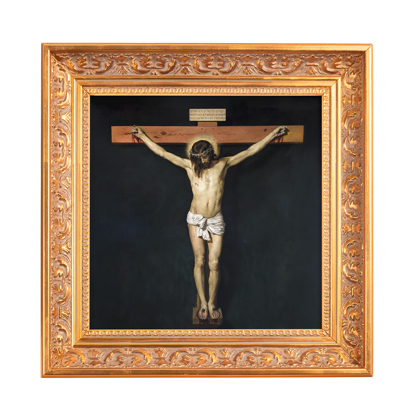 Framed painting depicts Jesus Christ on the cross with a gold ornate frame and a dark background.