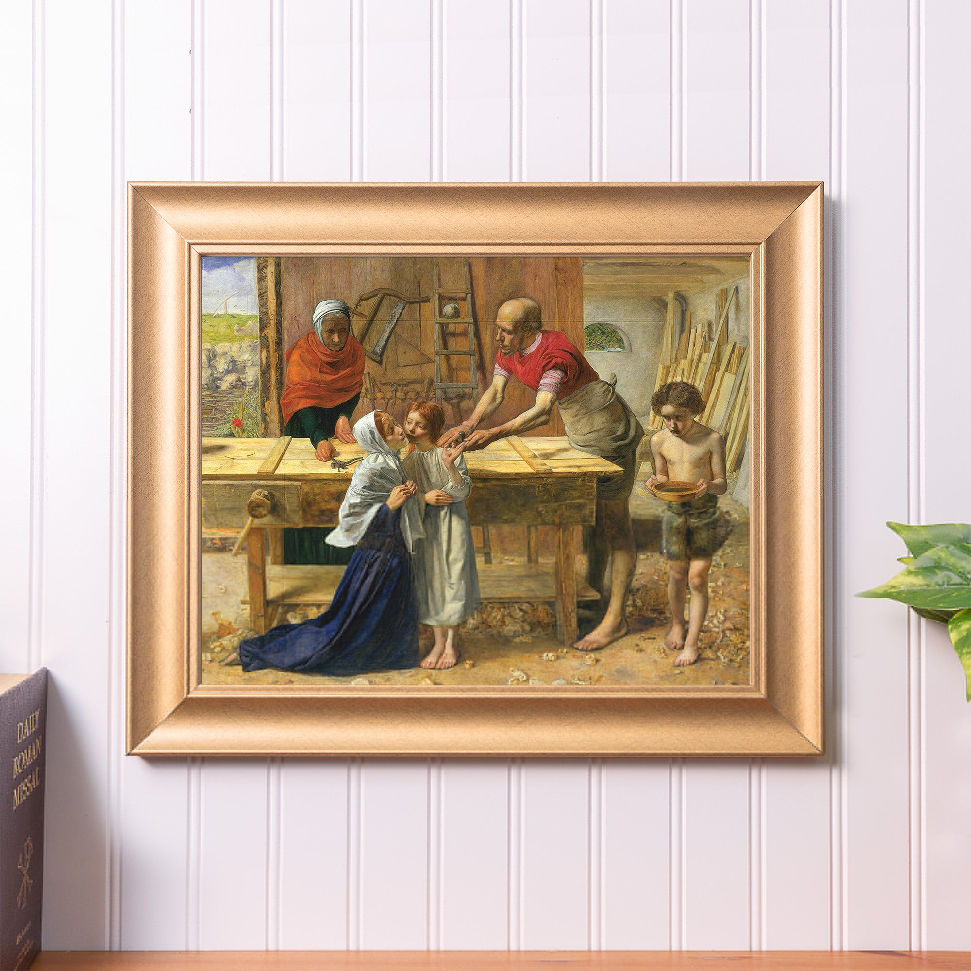 Framed oil painting of "Christ in the House of His Parents" in a gold frame, depicts a family working in a wood shop.