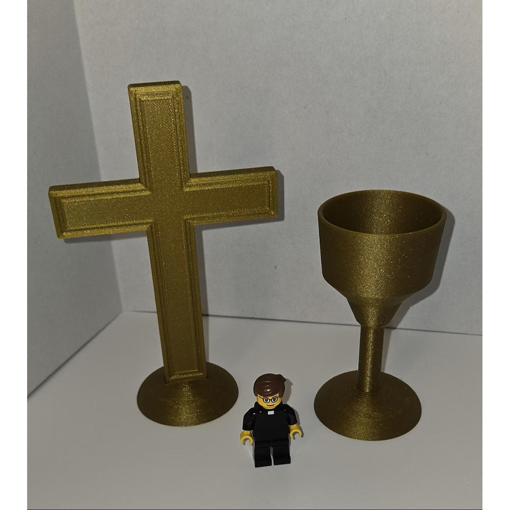 Religious toy set with a gold cross, chalice and priest minifigure.