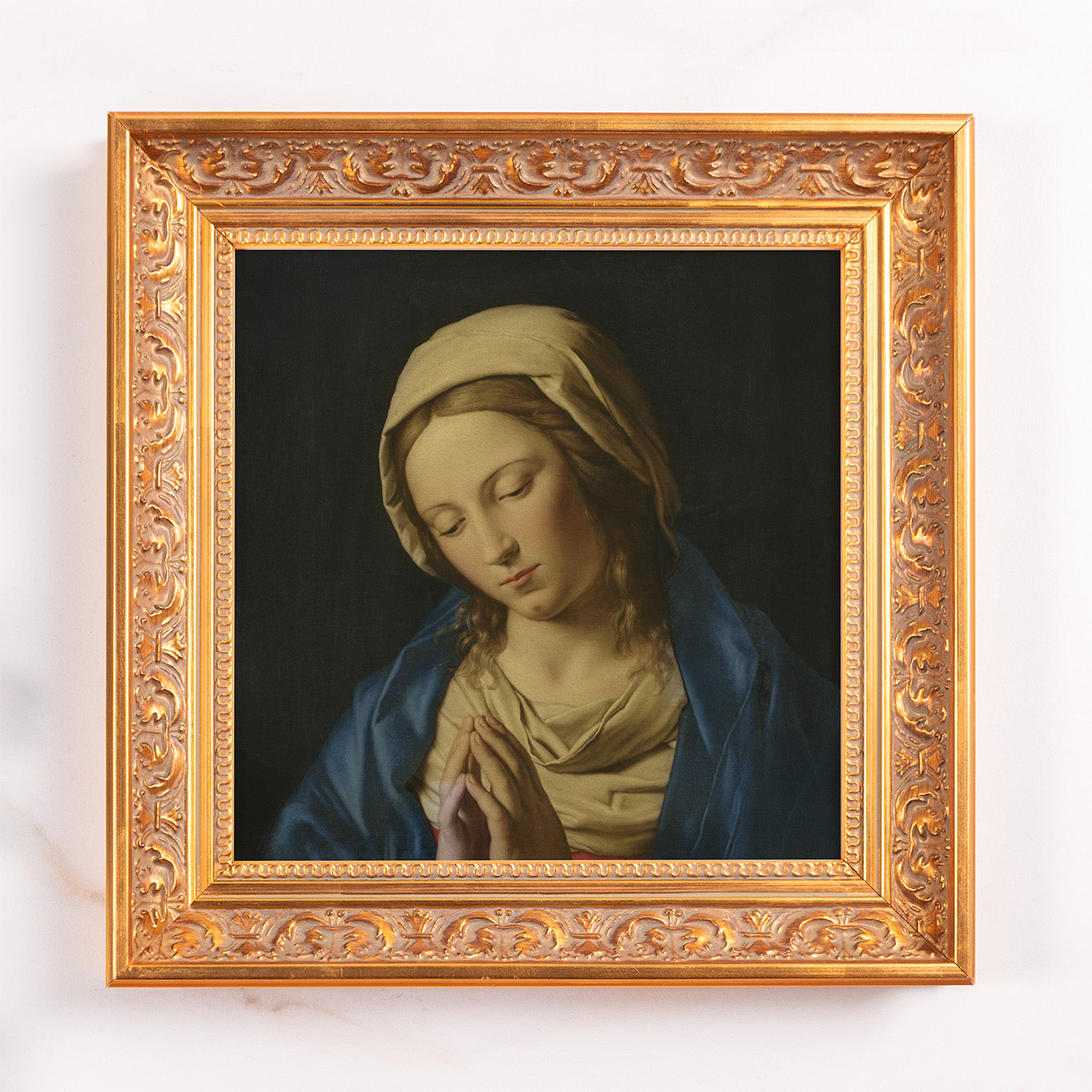 Framed Virgin Mary print for wall décor; gold frame, blue cloak, classic style.