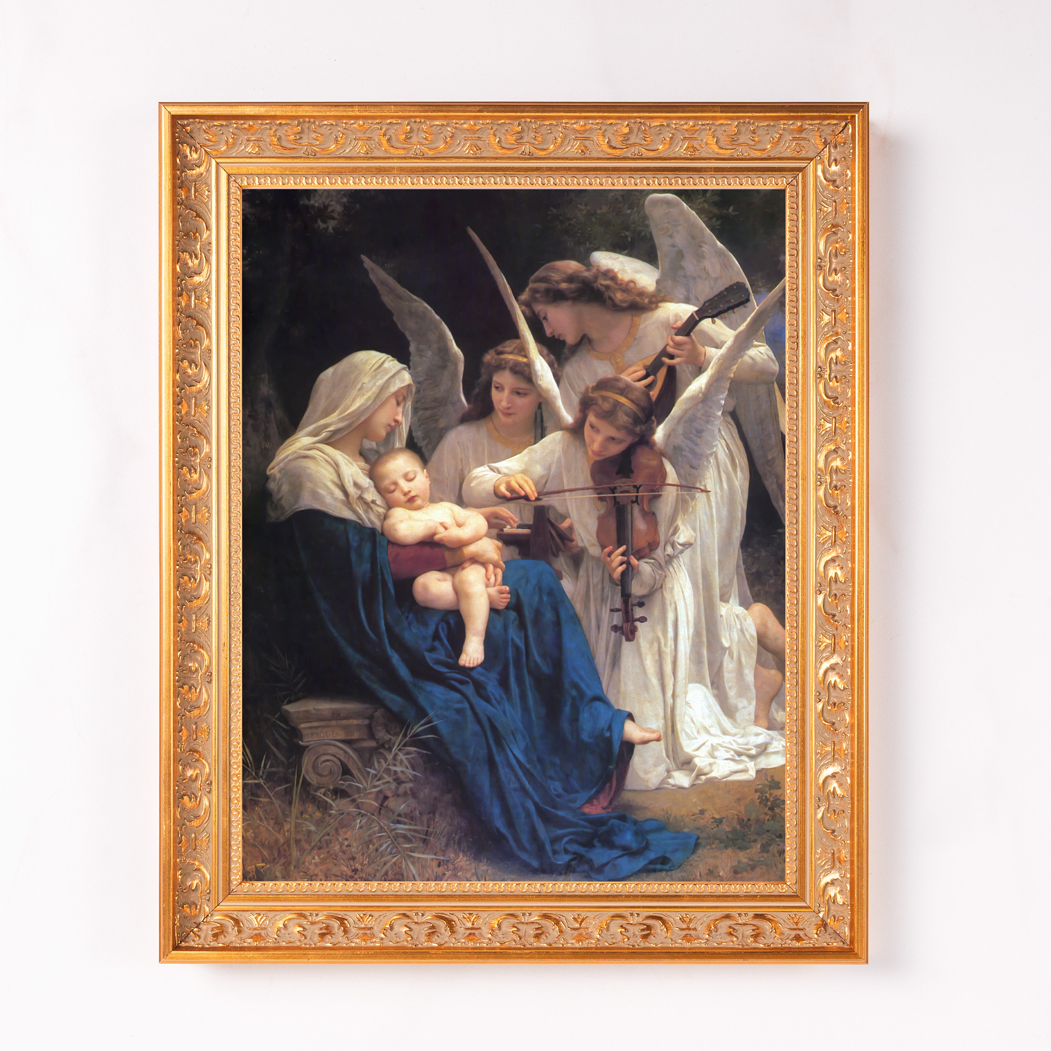 Framed painting shows angels playing instruments for mother and child, gold frame.