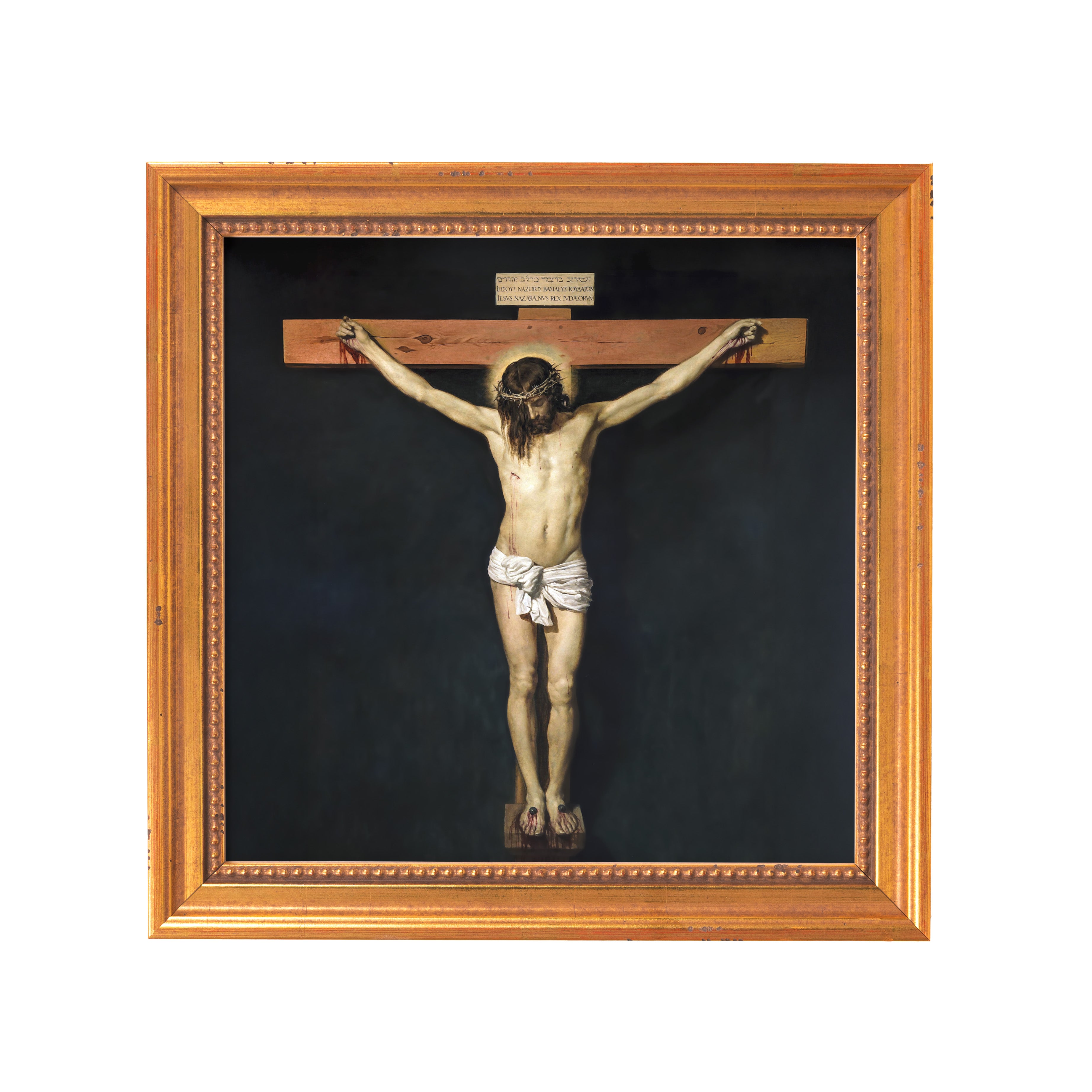 Framed painting of Jesus Christ on the cross with a golden frame.