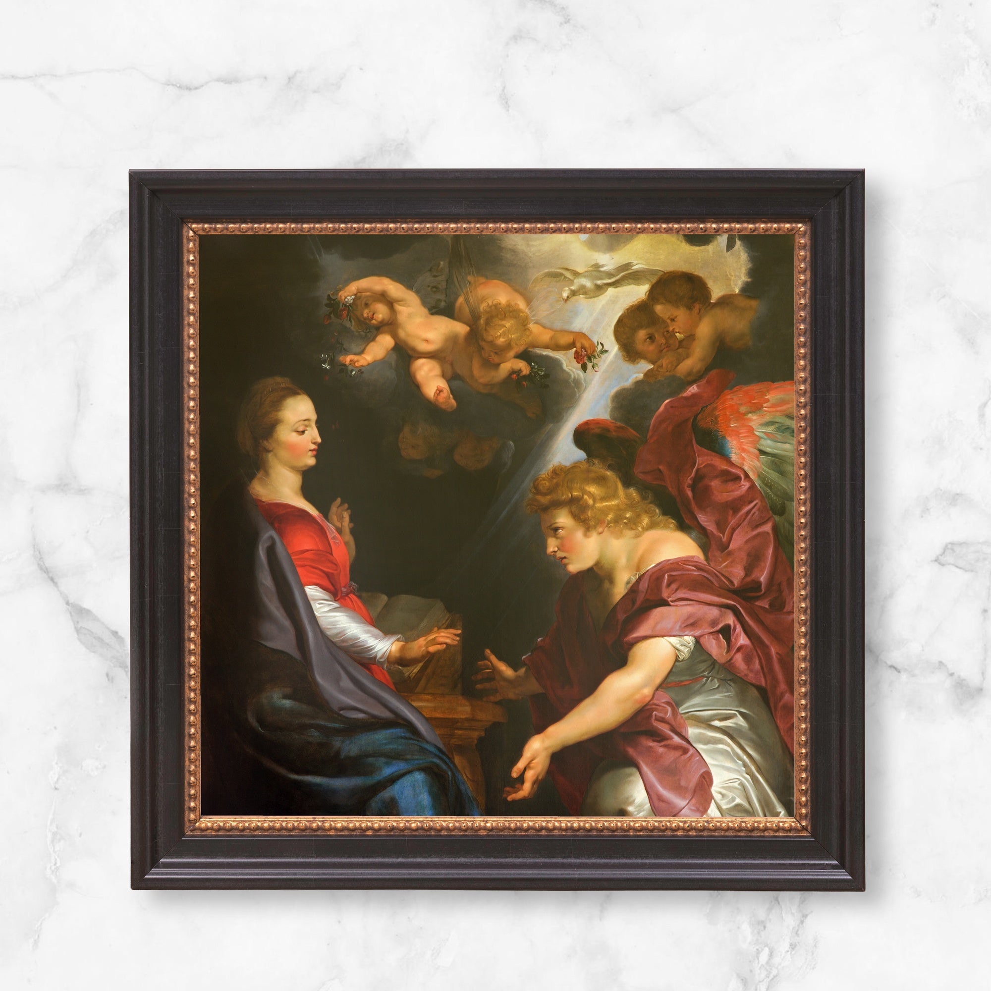 Framed "Annunciation" Print: Black wood frame surrounds a classic oil painting of Mary and an angel surrounded by cherubs.