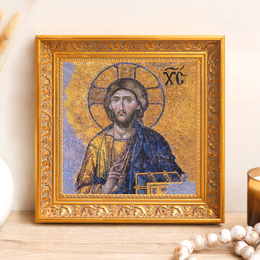 Framed Jesus Christ icon. Mosaic art, blue and gold colors with decorative gold frame.