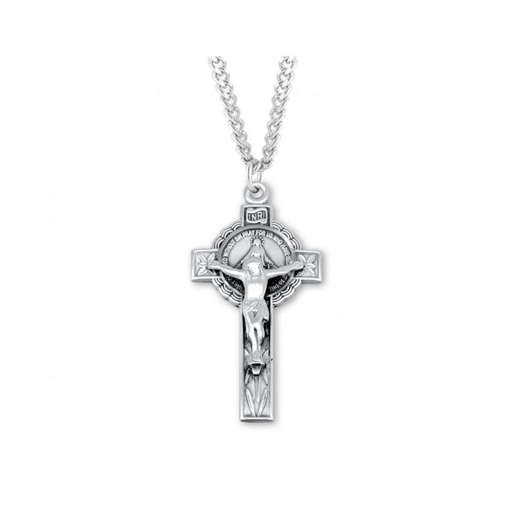 Silver crucifix necklace, with a detailed cross, chain, and engraving around the edges of the cross pendant.