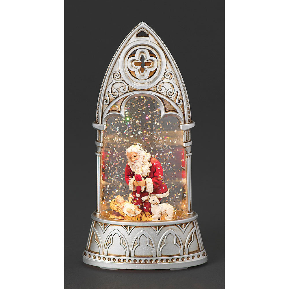 Lighted Shimmer Kneeling Santa in the Cathedral Snow Globe - 6"