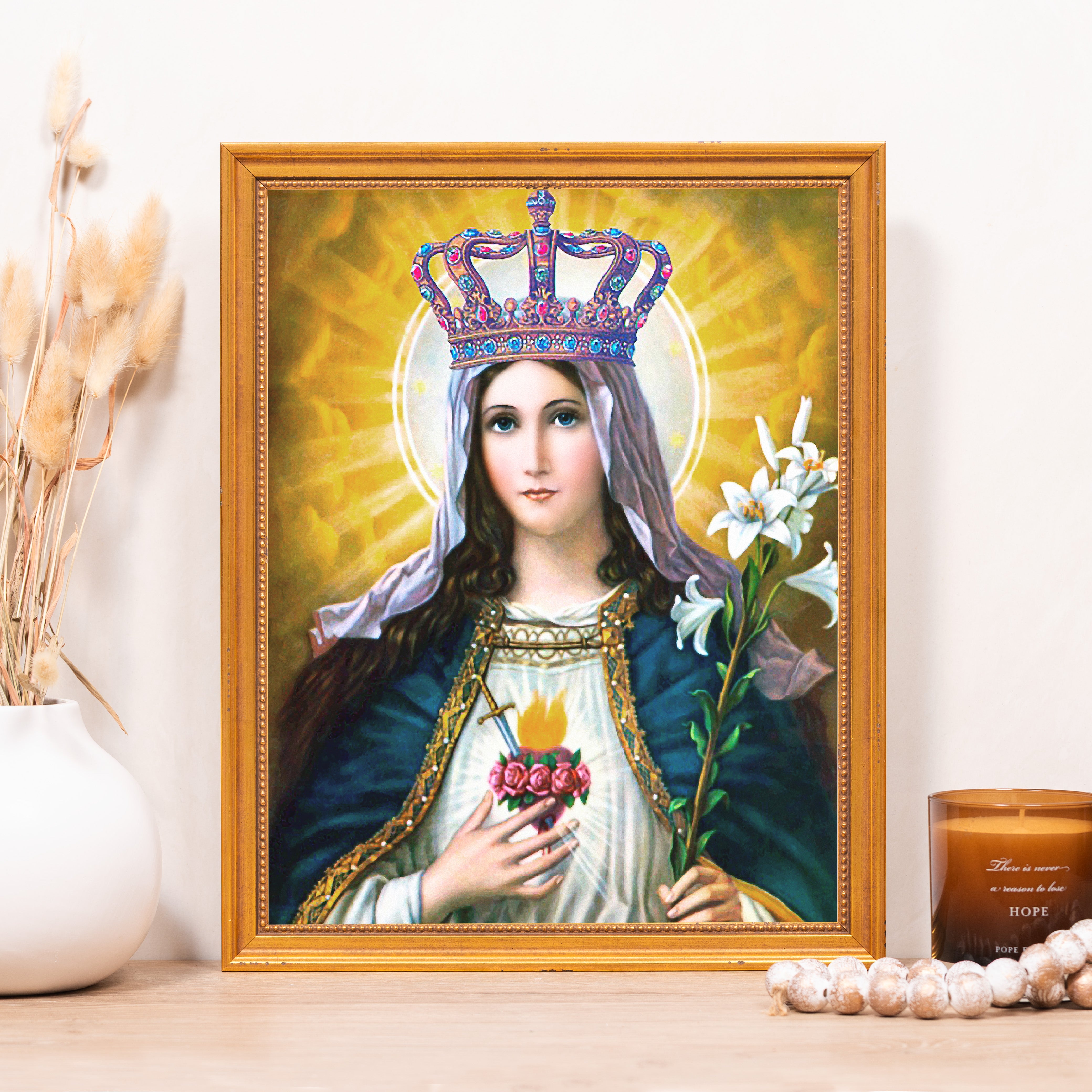 Framed painting: Virgin Mary with crown, heart, sword, lilies, in gold frame.