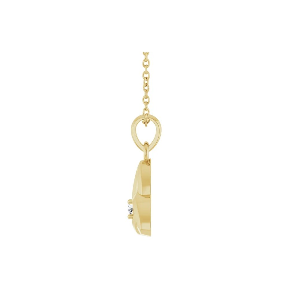 Gold pendant necklace with a diamond accent and chain.