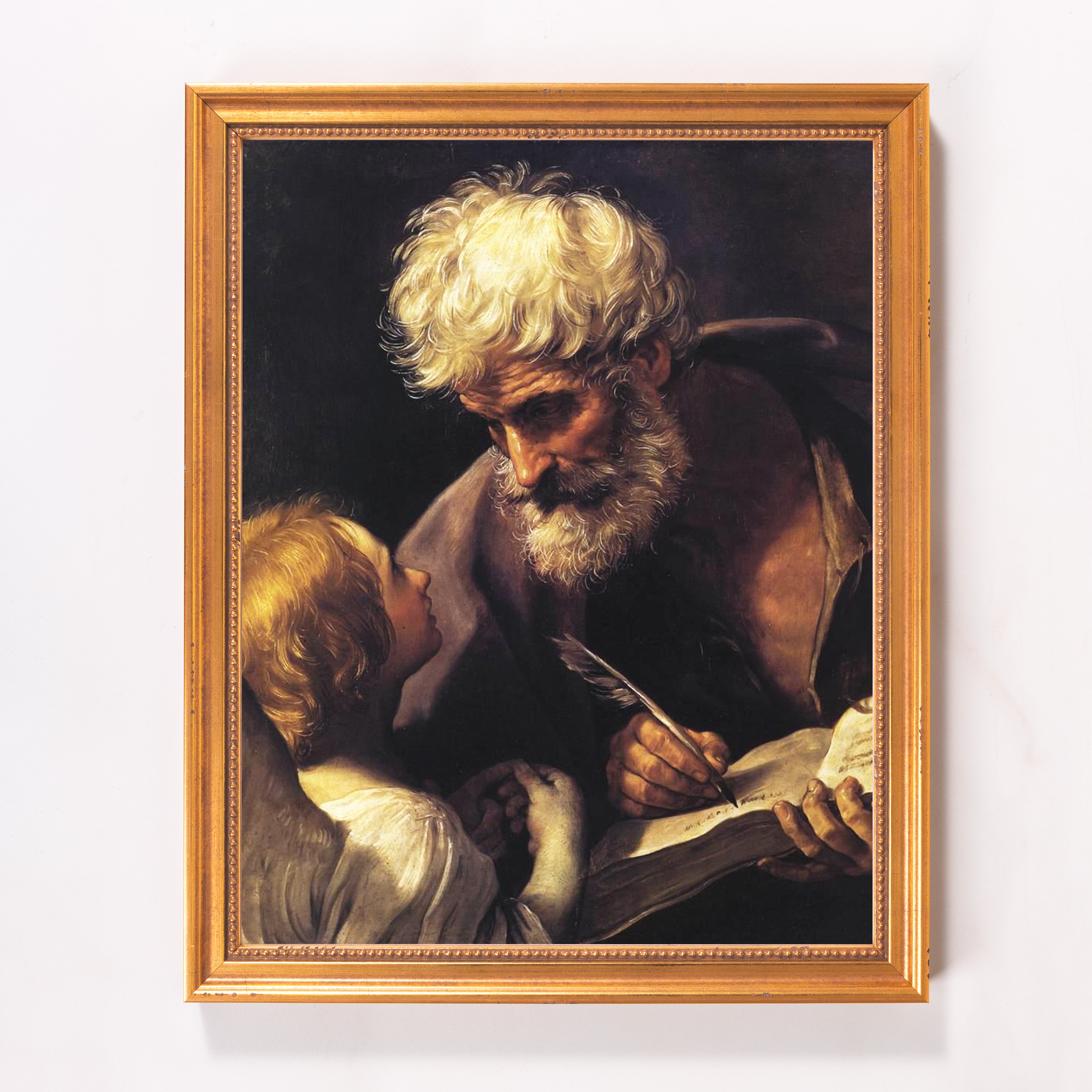 Framed portrait of Saint Joseph teaching Jesus, oil on canvas with a gold frame.