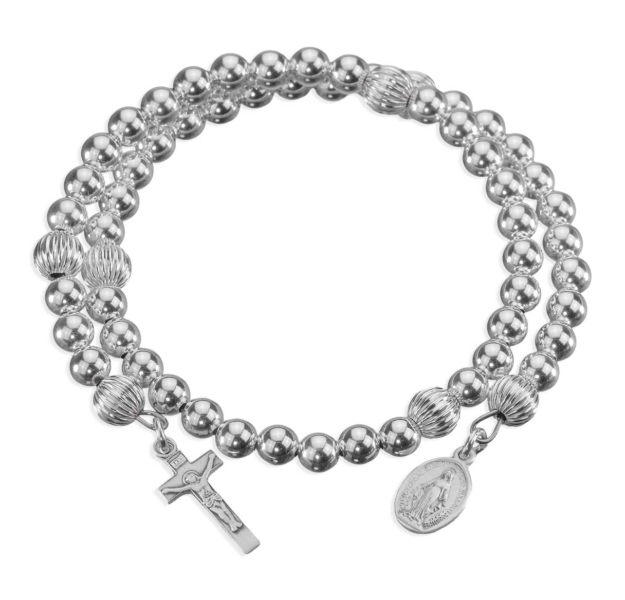 Silver rosary bracelet with round beads, ribbed accent beads, cross, and medallion charms.
