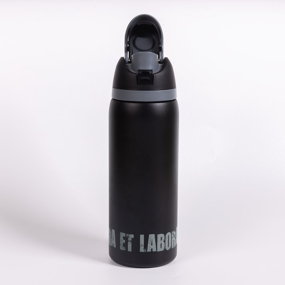 Black stainless steel water bottle with a gray plastic lid and a straw function, with text on the side.