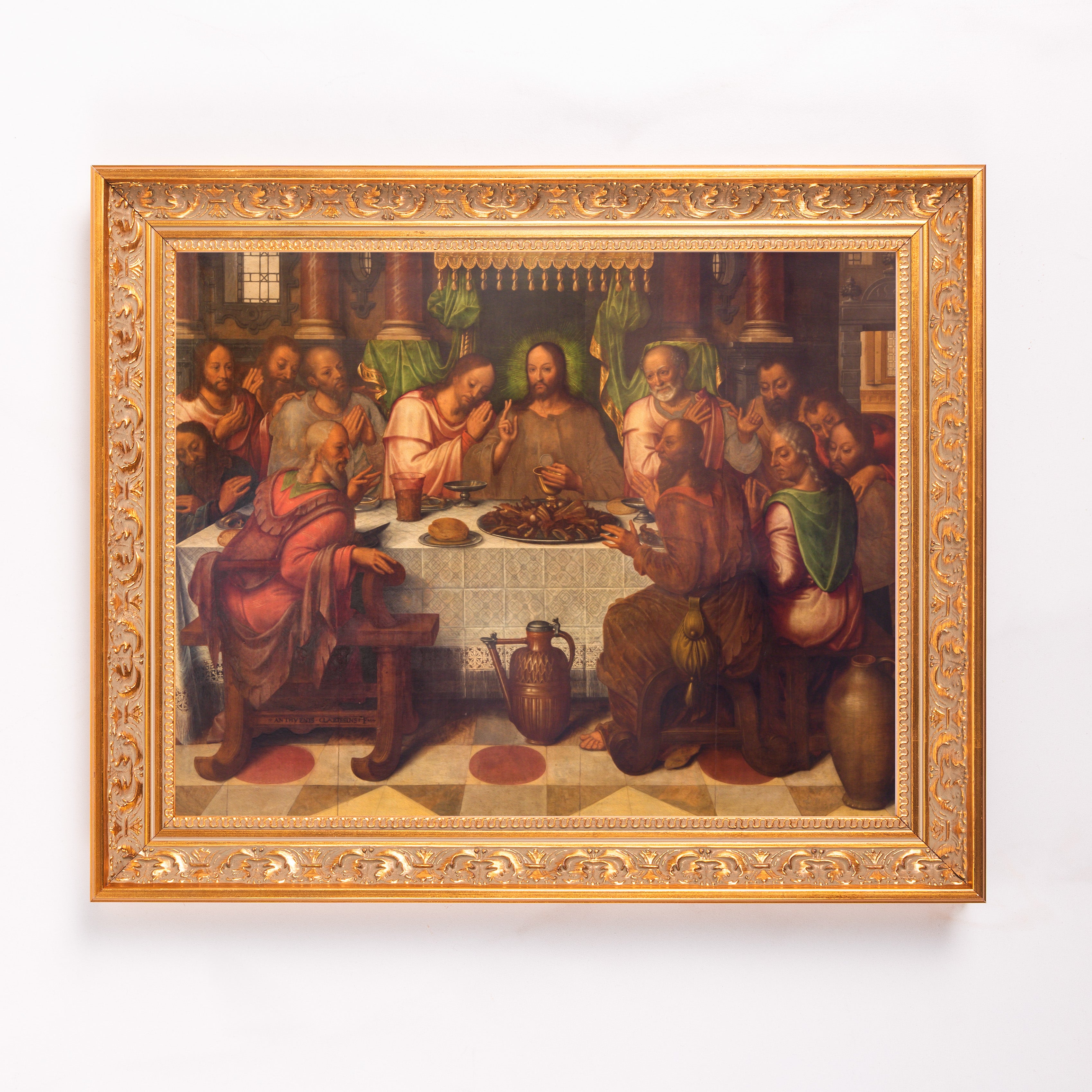 Painting: The Last Supper scene depicted in earth tones and framed in ornate gold.