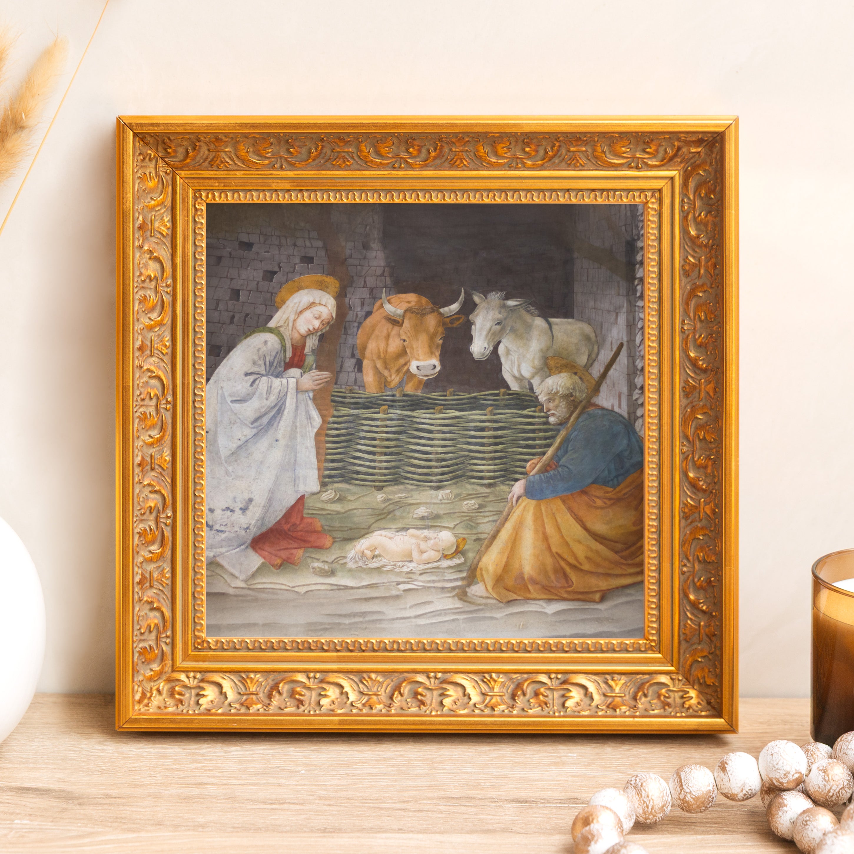 Framed, Nativity art print with detailed gold frame for holiday decor.