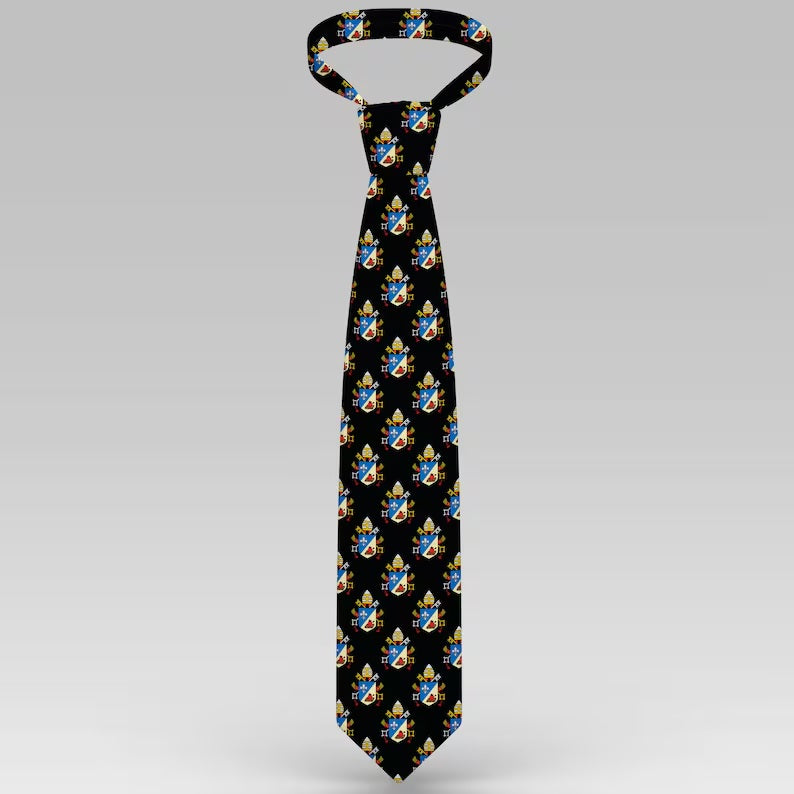 Black necktie with an emblem pattern, business or formal attire.